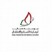 Logo of Dubai Foundation for Women & Children, featuring a stylized flame with red, white, and green colors and Arabic and English text
