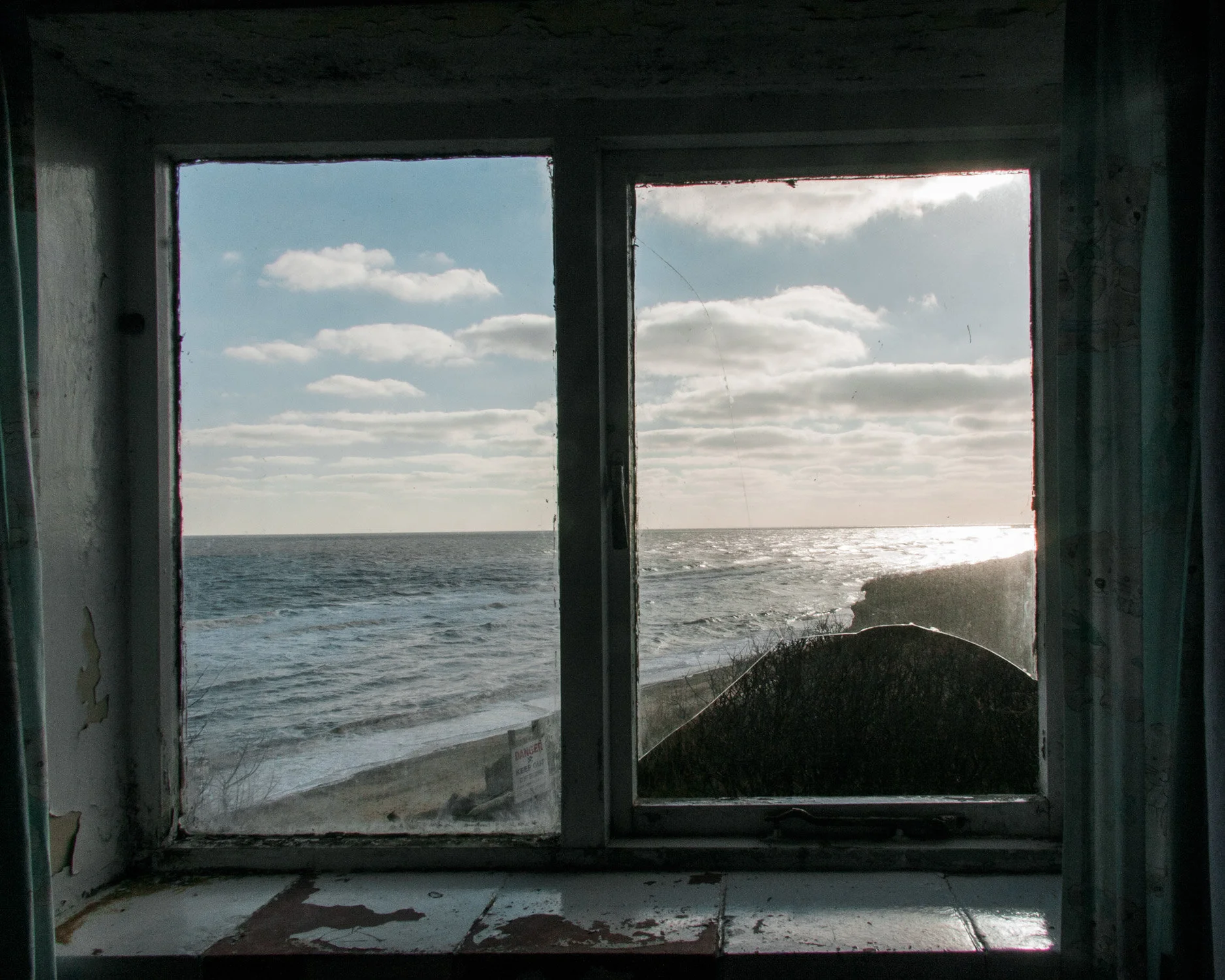 The view from an abandoned house in Eastern Bavents, Suffolk. While defence works at the larger, more popular seaside resorts continues apace, this tiny community’s increasingly desperate demands for protection go unheeded by the authorities.