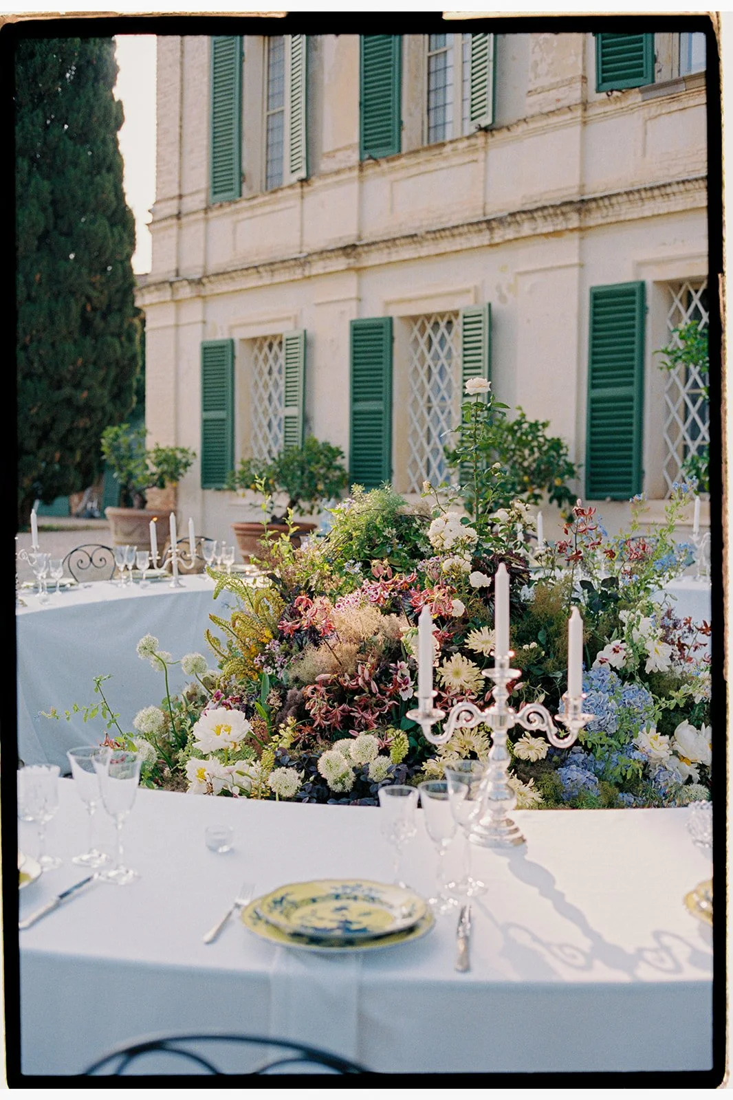 Floral centerpiece on a table at Villa di Geggiano in Italy.