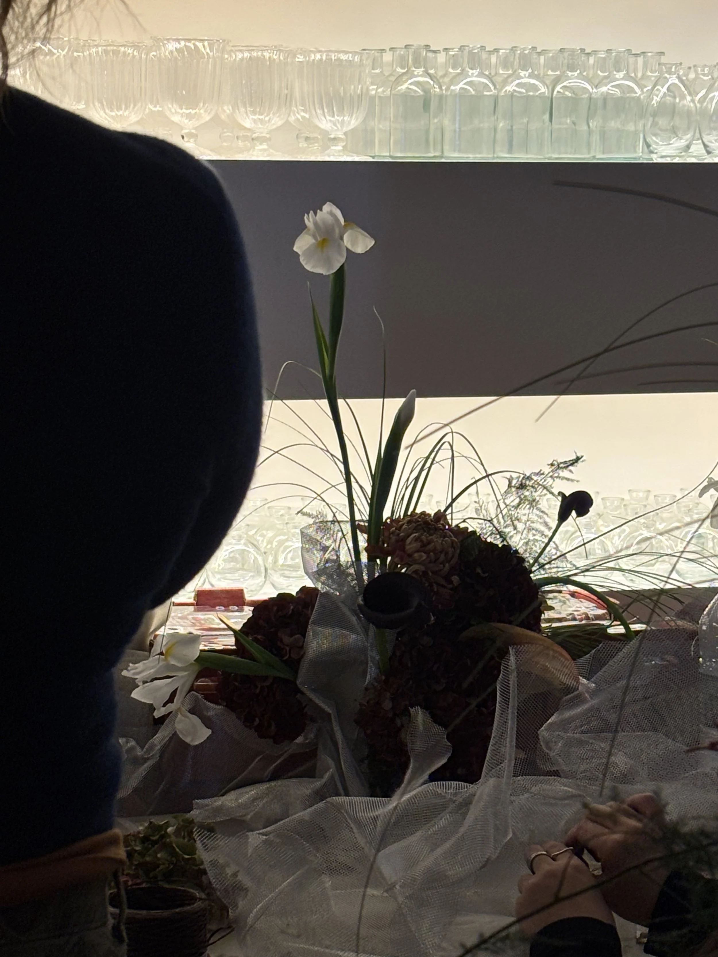 Floral arrangement in progress in the studio