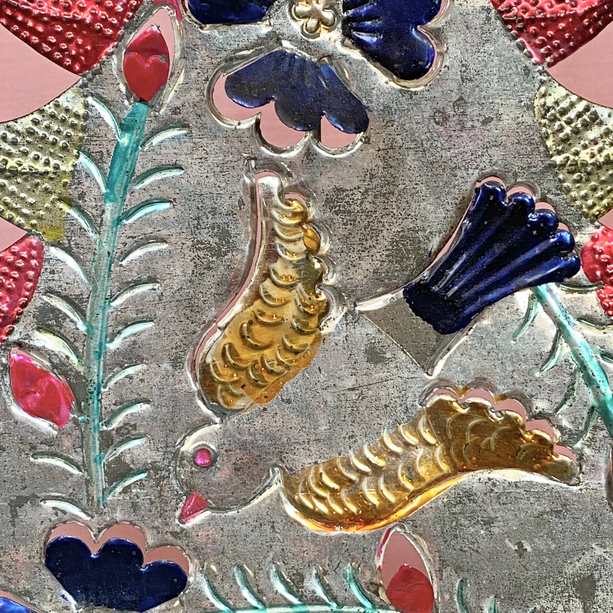 Bird and flowers handpainted onto a metal Christmas Tree for vintage decorating