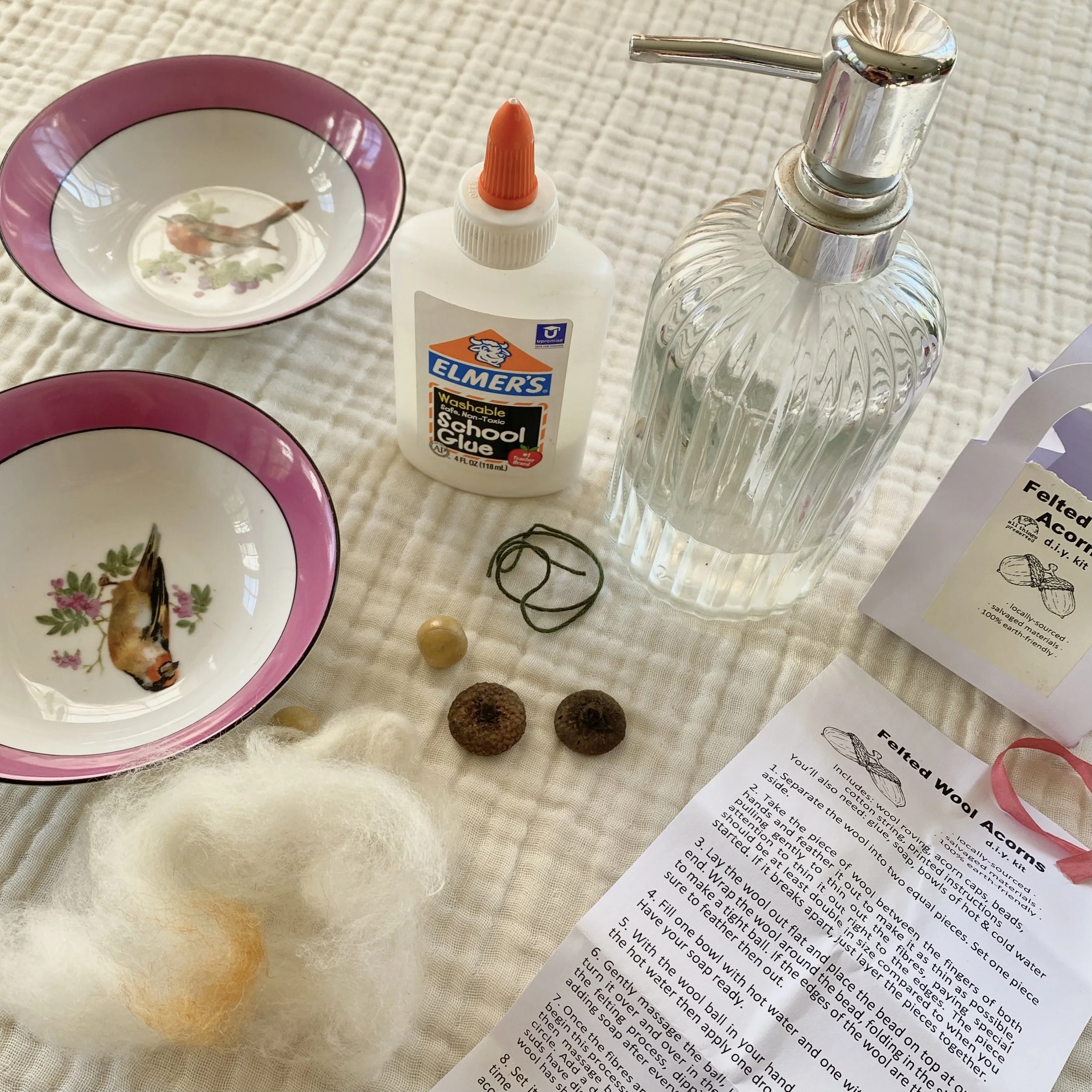 Detail of the process of making handfelted acorn ornaments
