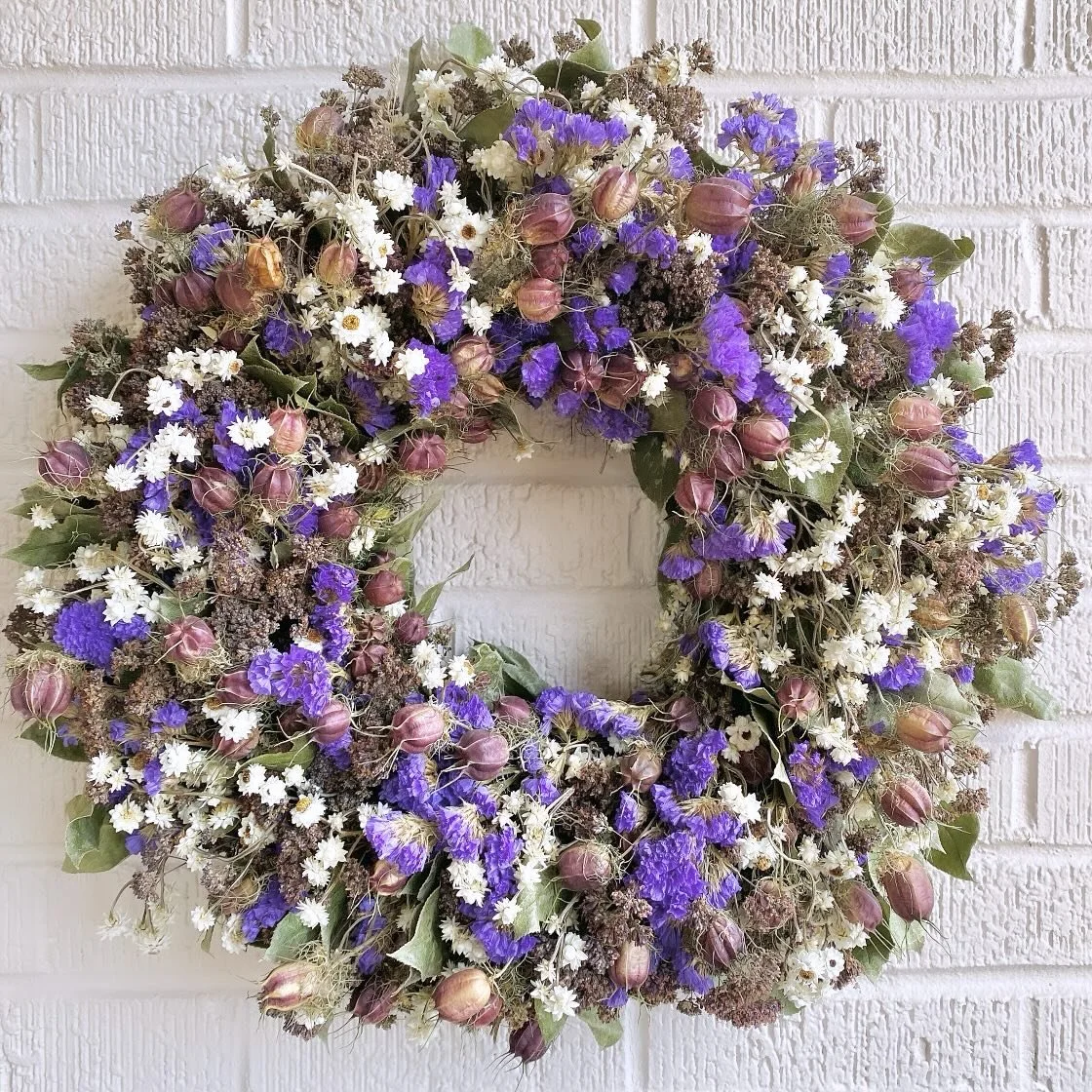 Purple on purple on purple 💜

Layers of oregano, nigella, and statice dotted with white ammobium in a bed a dried lemon leaf, a naturally vibrant wreath to enjoy for years to come! 
.
.
.
#fruitandflower #flowershop #driedflowers #preservedflowers #
