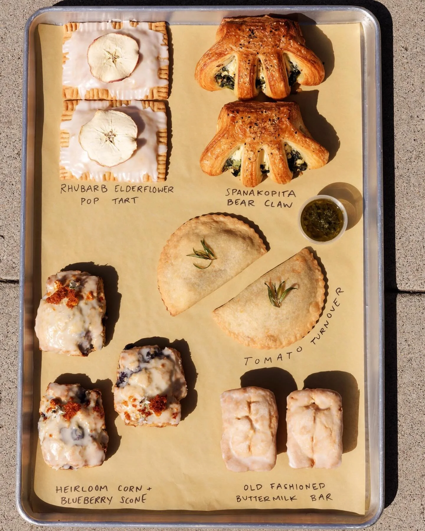 spring pastry offerings 🫐🍅🌱

heirloom corn + blueberry scone
rhubarb elderflower poptart [vg]
tomato turnover [vg]
old fashioned buttermilk bar [gf]
spanakopita bear claw 

plus our mainstays, all made fresh from scratch daily here at Revo.
