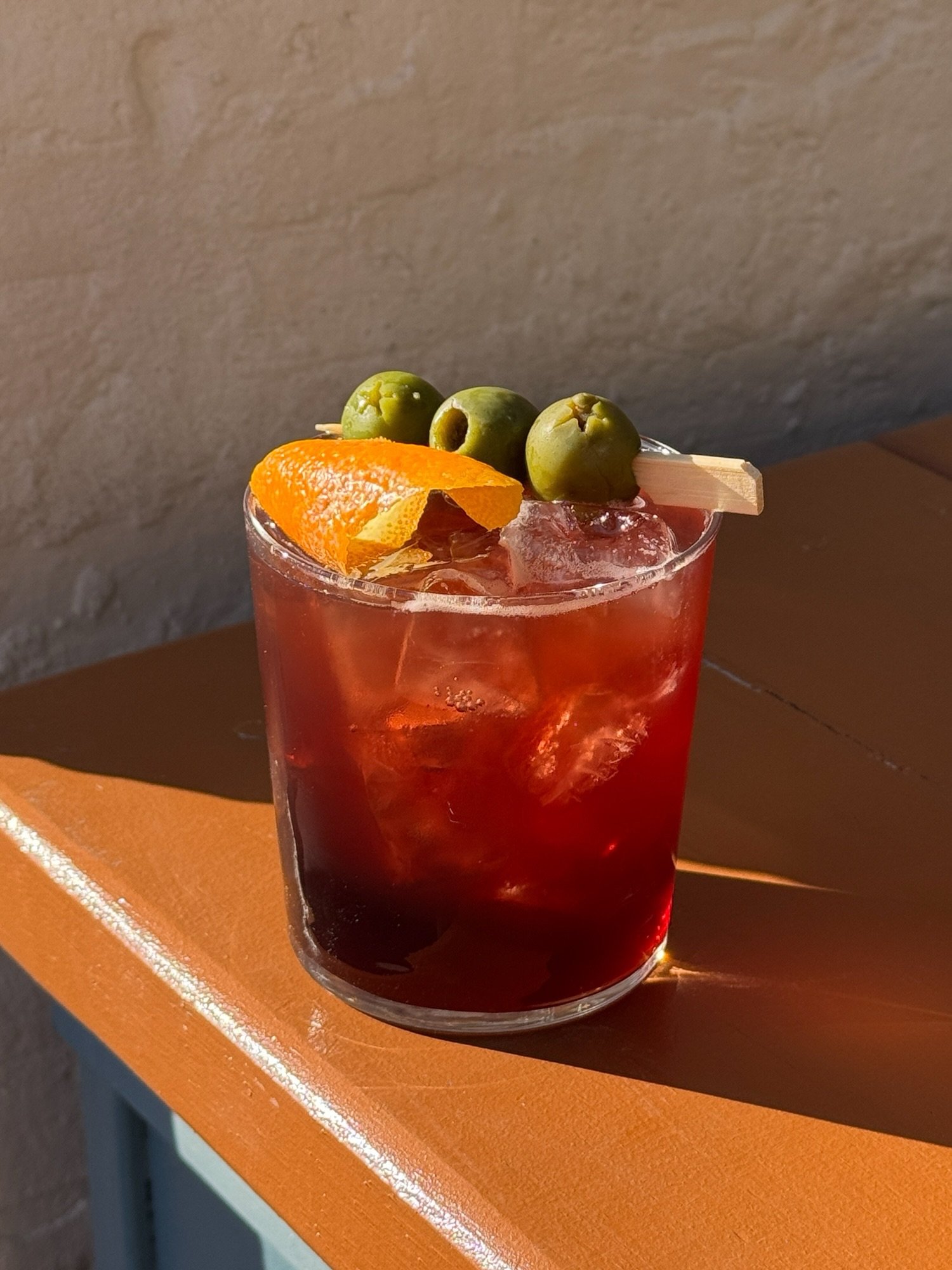 CATALAN VERMUT SEASON.⁠
⁠
When working with amazing ingredients, simplicity is almost always best. The Catalan Vermut found on our cocktail menus features Partida Creus&rsquo; MUZ Vermut, soda, castelvetrano olives, and an orange swath. That&rsquo;s 