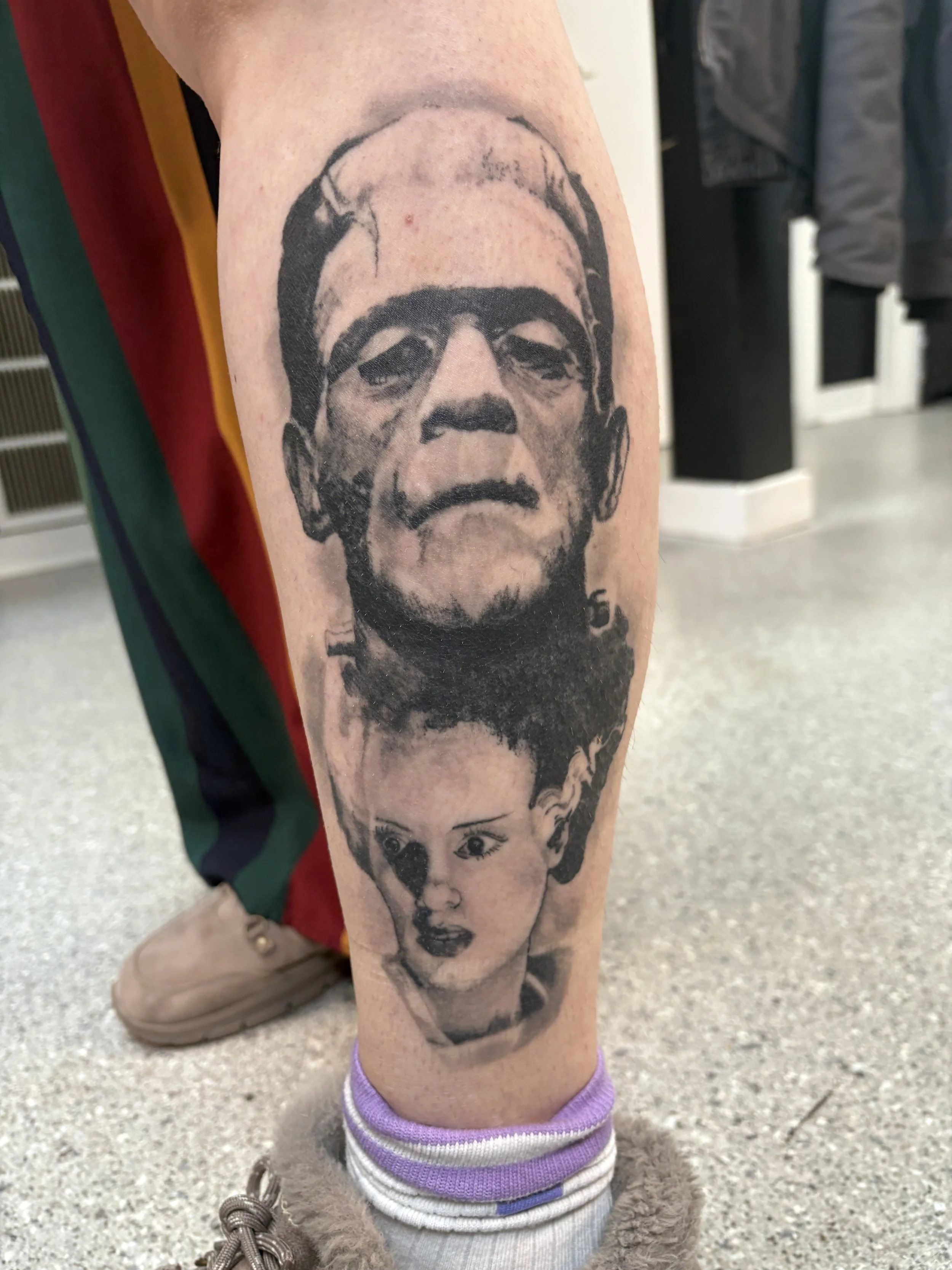 Healed black and grey realism tattoo of Frankensteins monster and bride. horror tattoo. walk in tattoo. Englewood Ohio. Joshua Scott. Midwestxjosh
