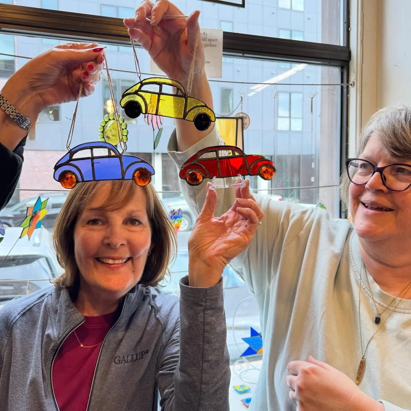 This private stained glass workshop was all about colorful Volkswagen Beetles. They absolutely brought their cars to life&mdash;such a fun way to spend an afternoon with friends. Message me to book your own private class! #stainedglass #stainedglassw
