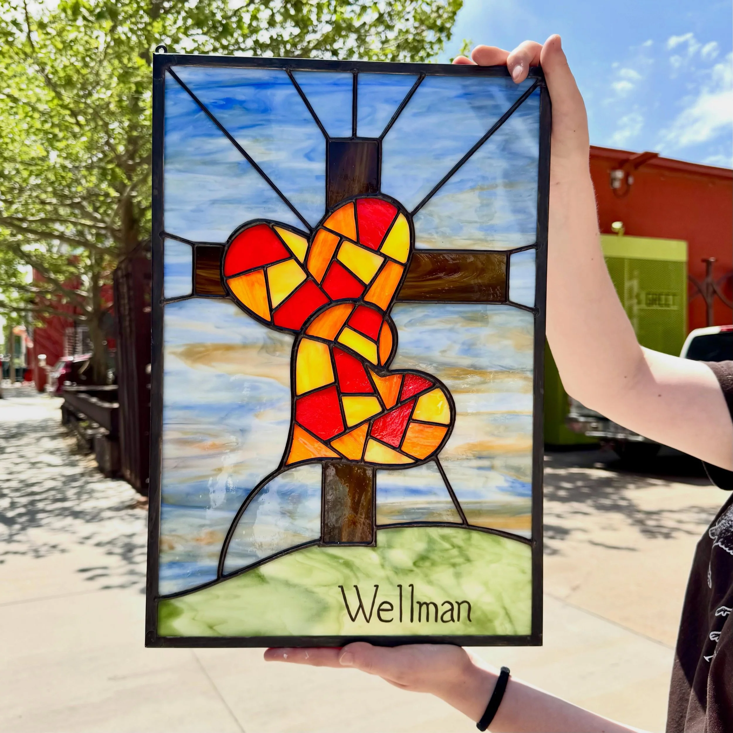 I created this custom stained glass wedding piece as a wedding gift from one best friend to another. It was designed for a couple who shares a love of faith and stained glass.

The mosaic-style design within the interlocking hearts was meant to refle