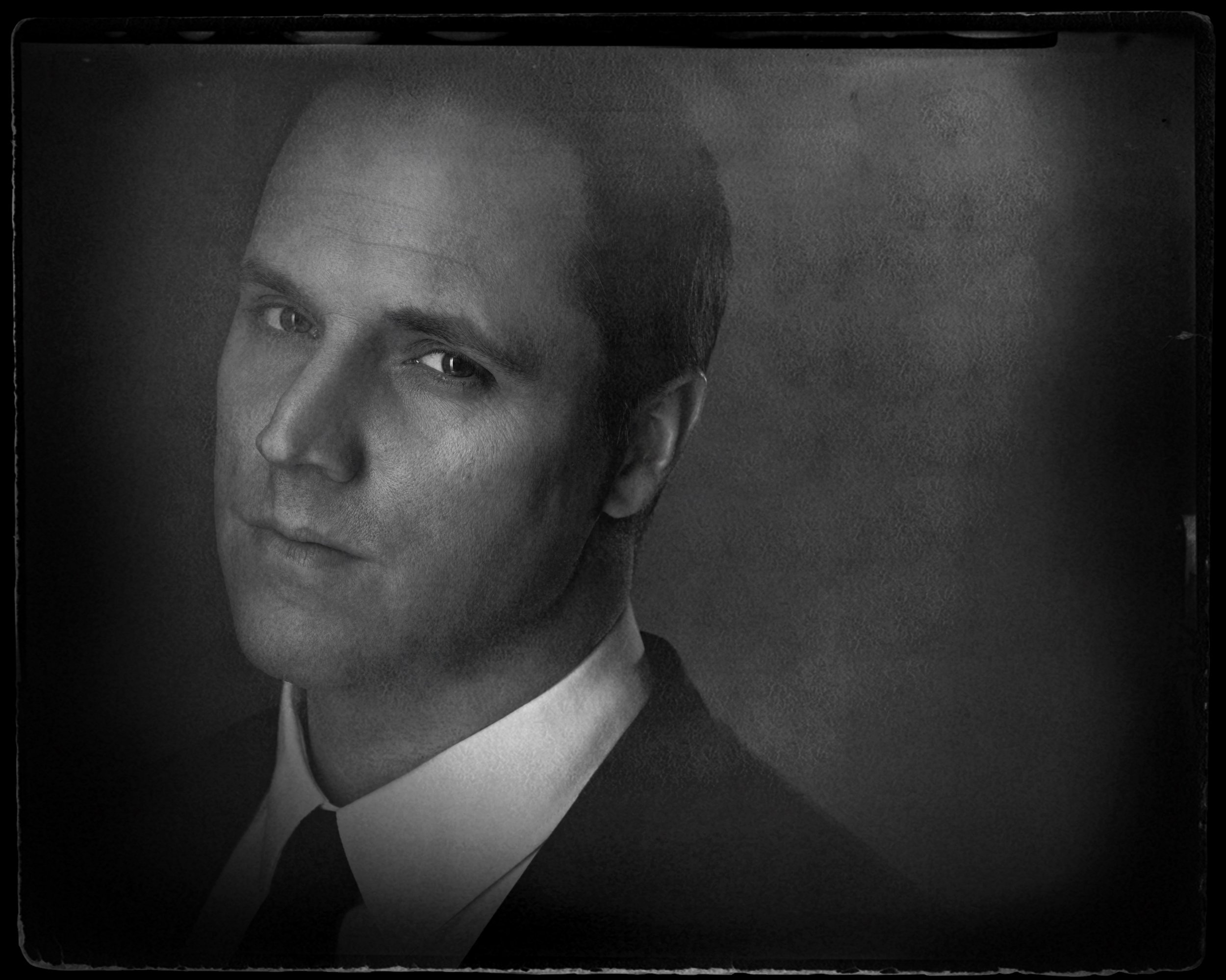 Eric Messner (he/him) as Christian Heurich