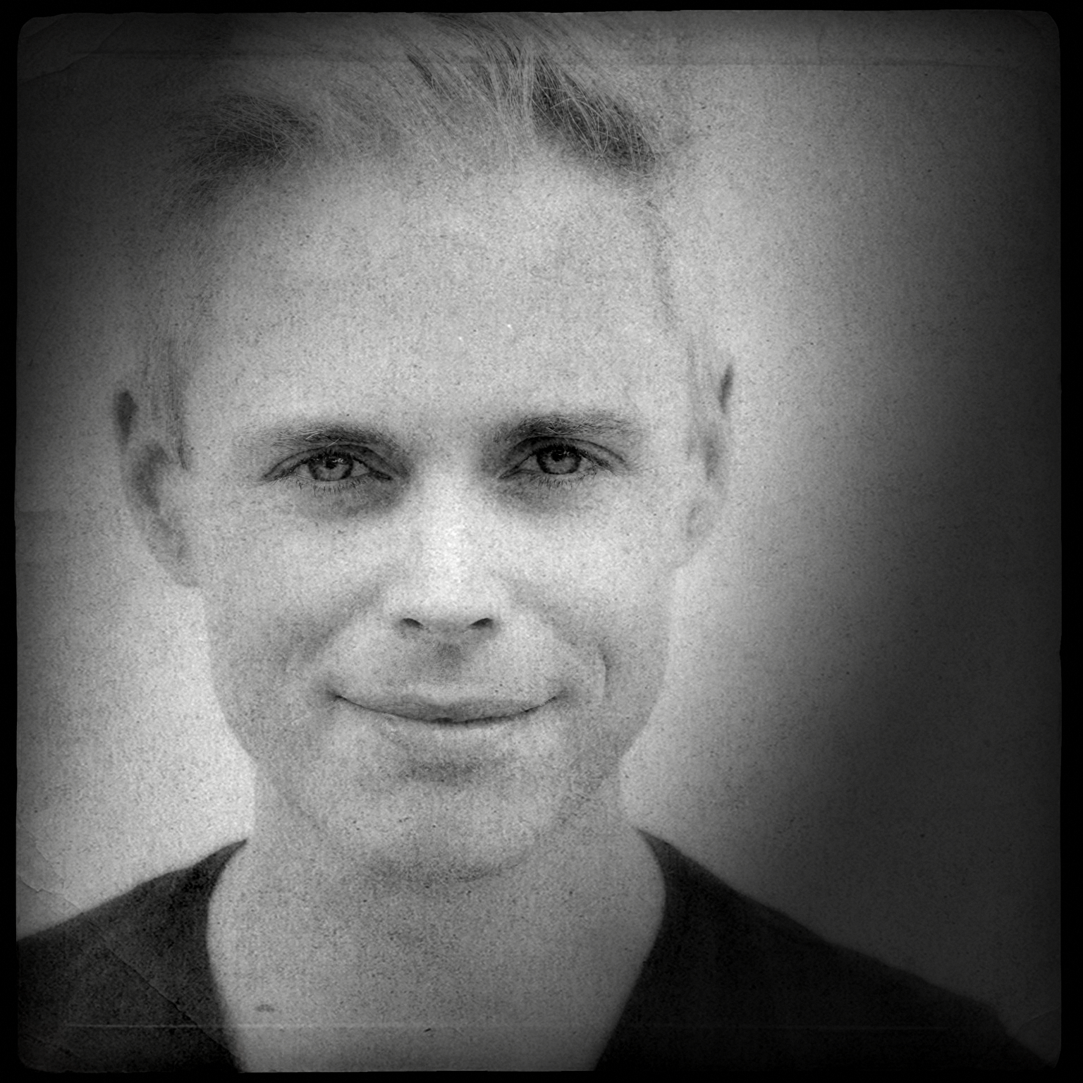 Jon Reynolds (he/him) as August Firestone