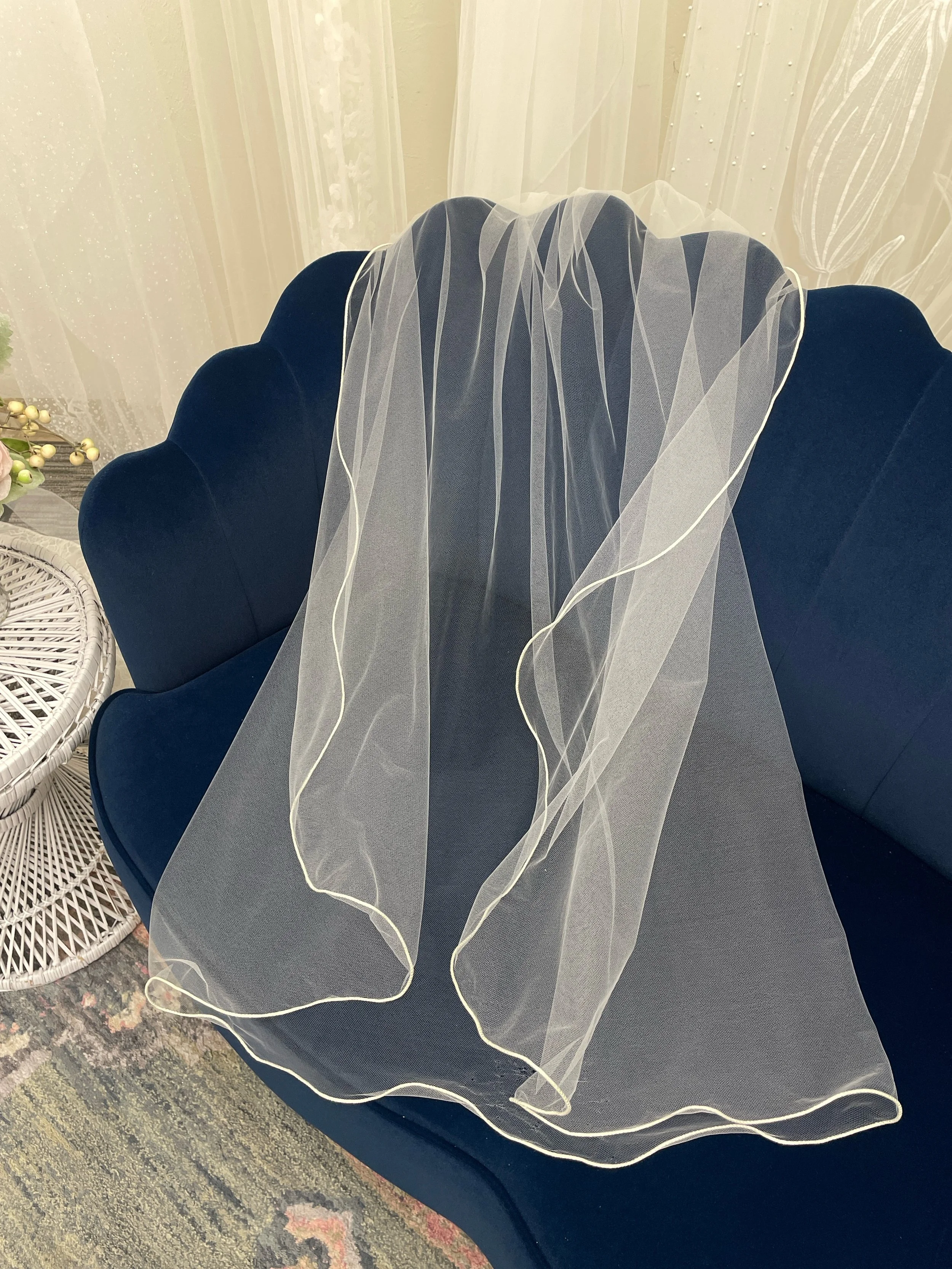 Veil:  40" fingertip length, pencil trim edge.
