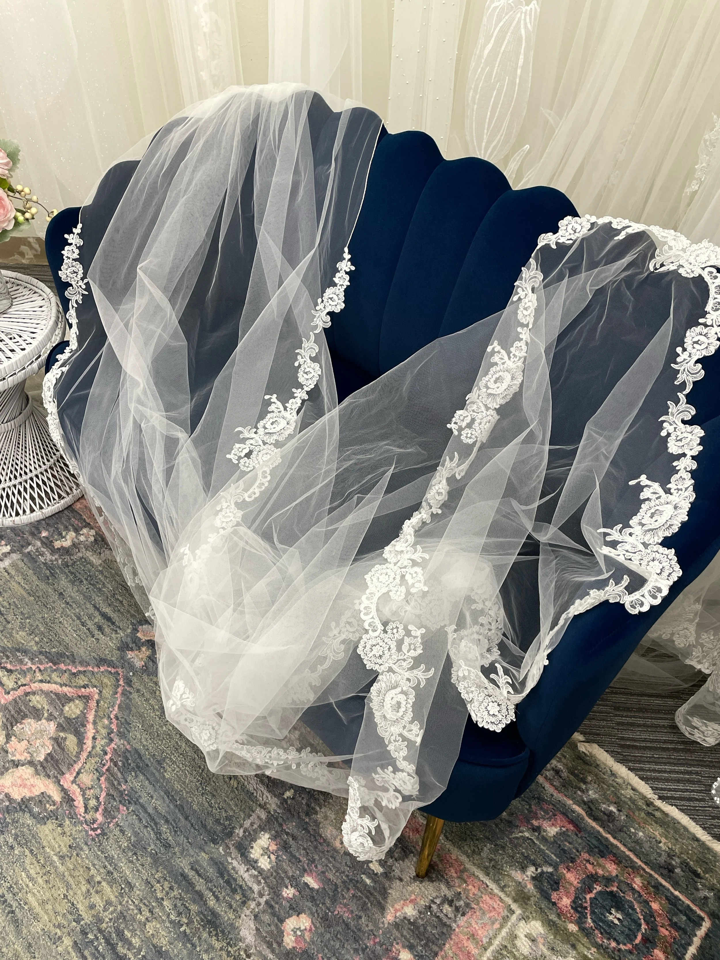 Veil:  Cathedral length trimmed with lace