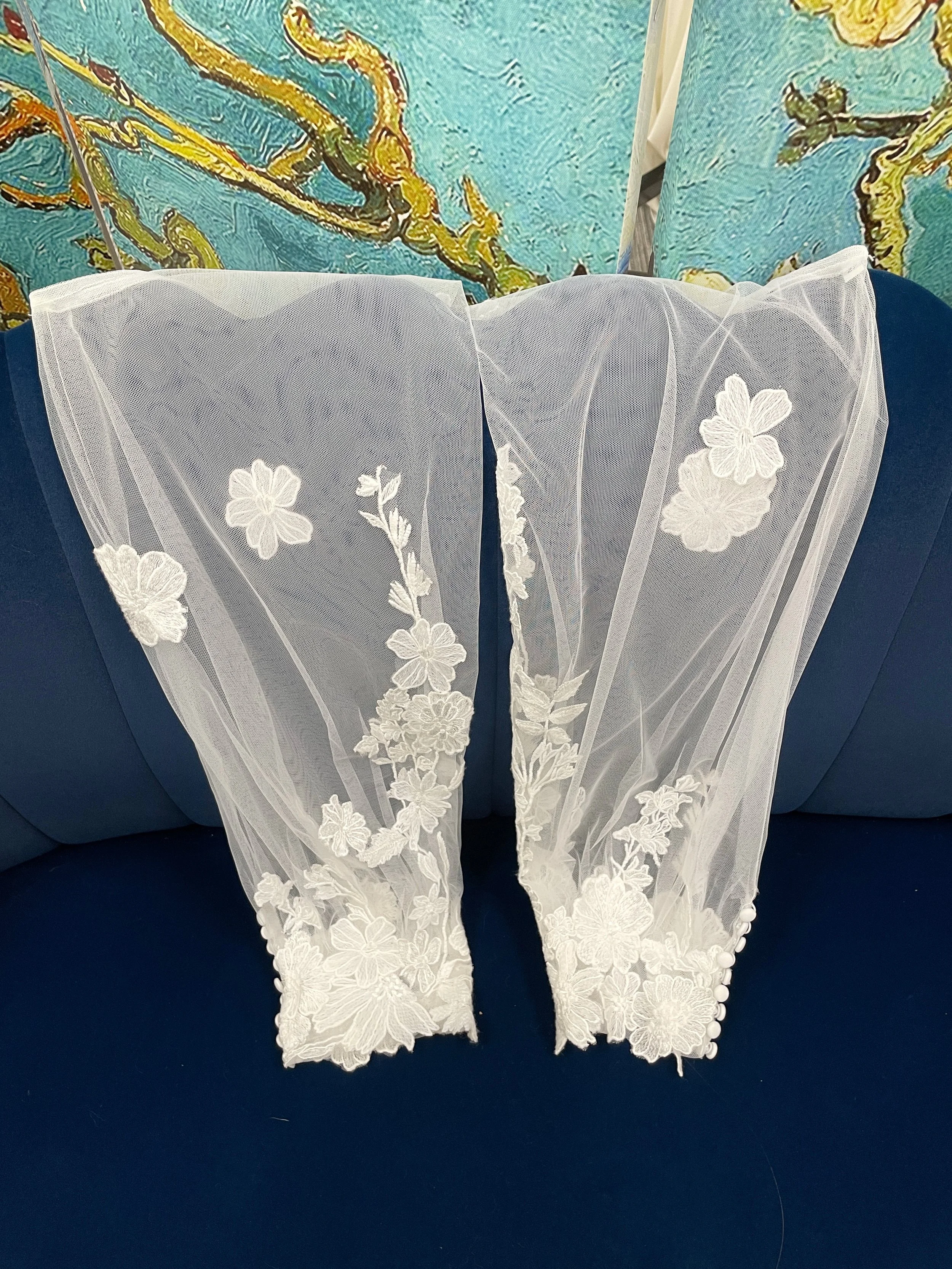 Sleeves: Long floral bishop sleeves