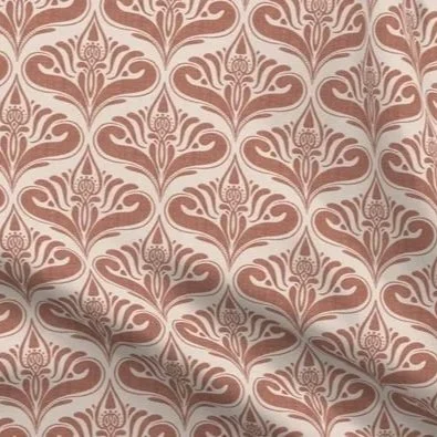 Close-up of paisley damask fabric in terracotta and cream