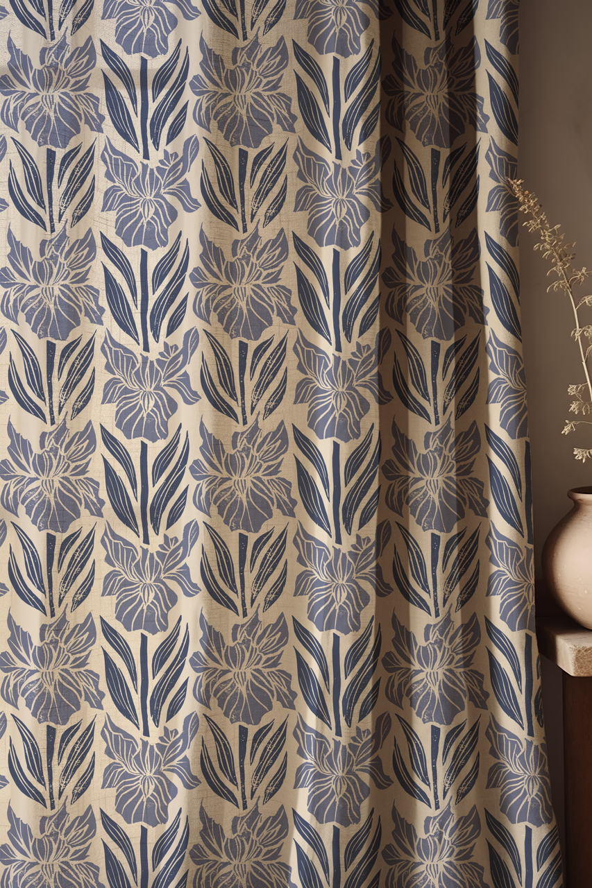 Navy, periwinkle and cream block print iris floral fabric used as curtains in a styled room
