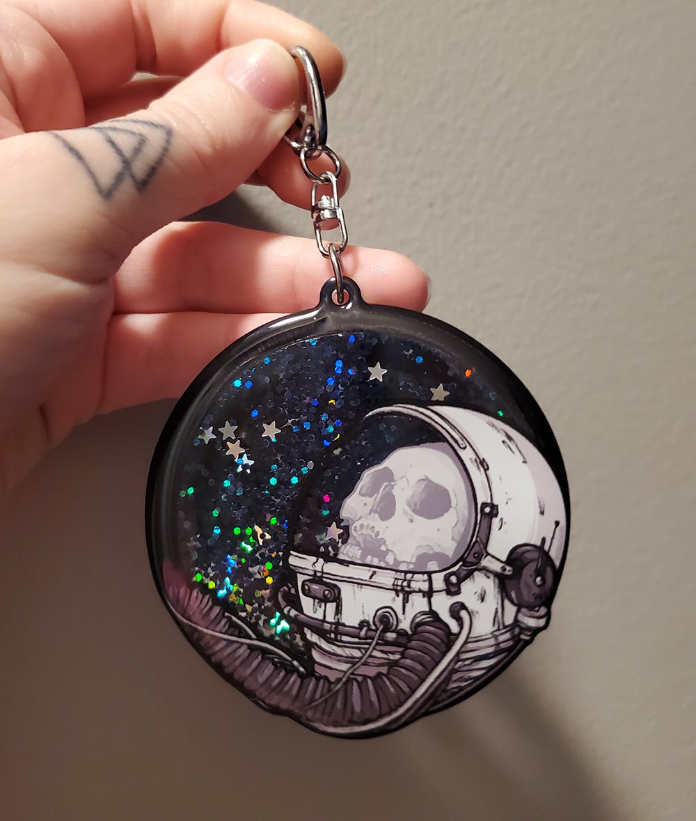 galaxy astronaut keychain