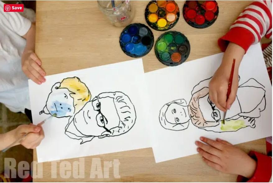 children drawing fathers day portrait with paints