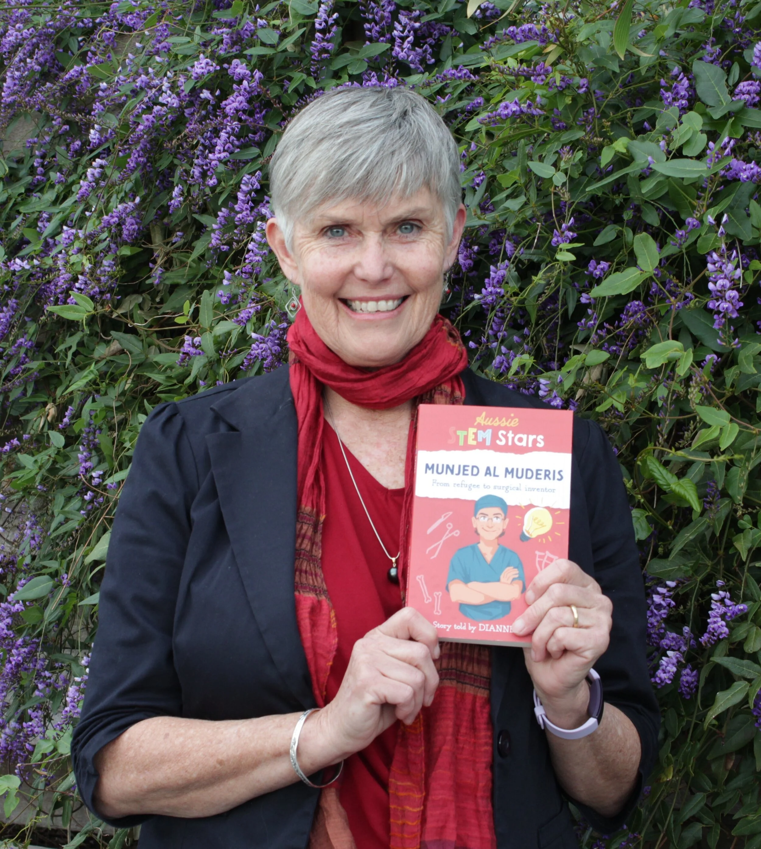 Dianne Wolfer_holdingbook_munjed02.jpg