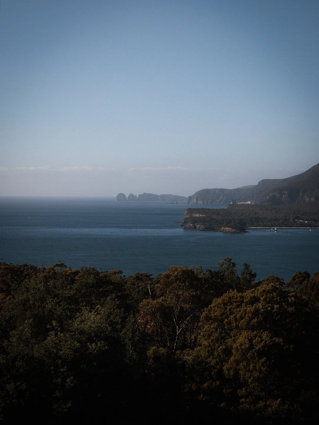 A view from a hill of the ocean