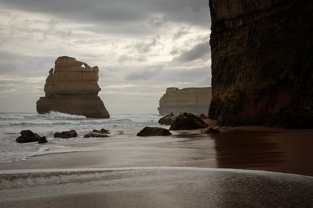 Moody rough ocean, giant rock formations rising from the water