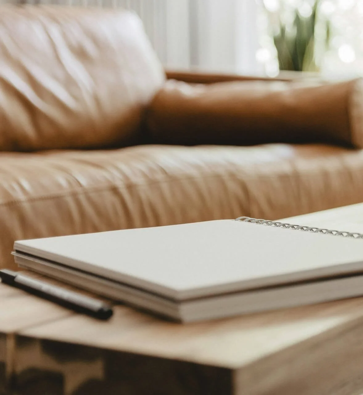 Couch and notebook, Laura Garcia LMFT Therapy in Modesto CA 95350