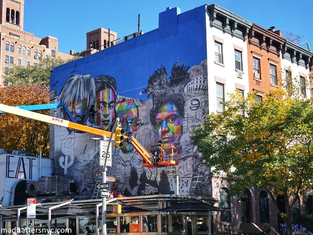 Kobra's Mount Rushmore mural featuring Andy Warhol, Frida Kahlo, Keith Haring and Jean-Michel Basquiat while in progress in Chelsea, New York City