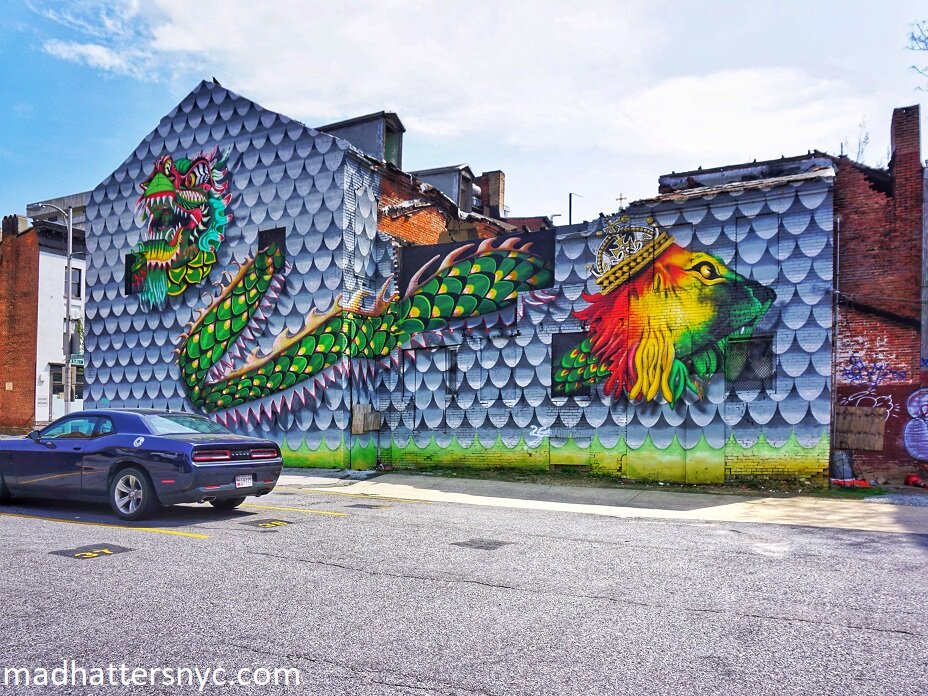 Mural with a Chinese dragon and the Lion of Judah by JAHRU in Mount Vernon, Baltimore
