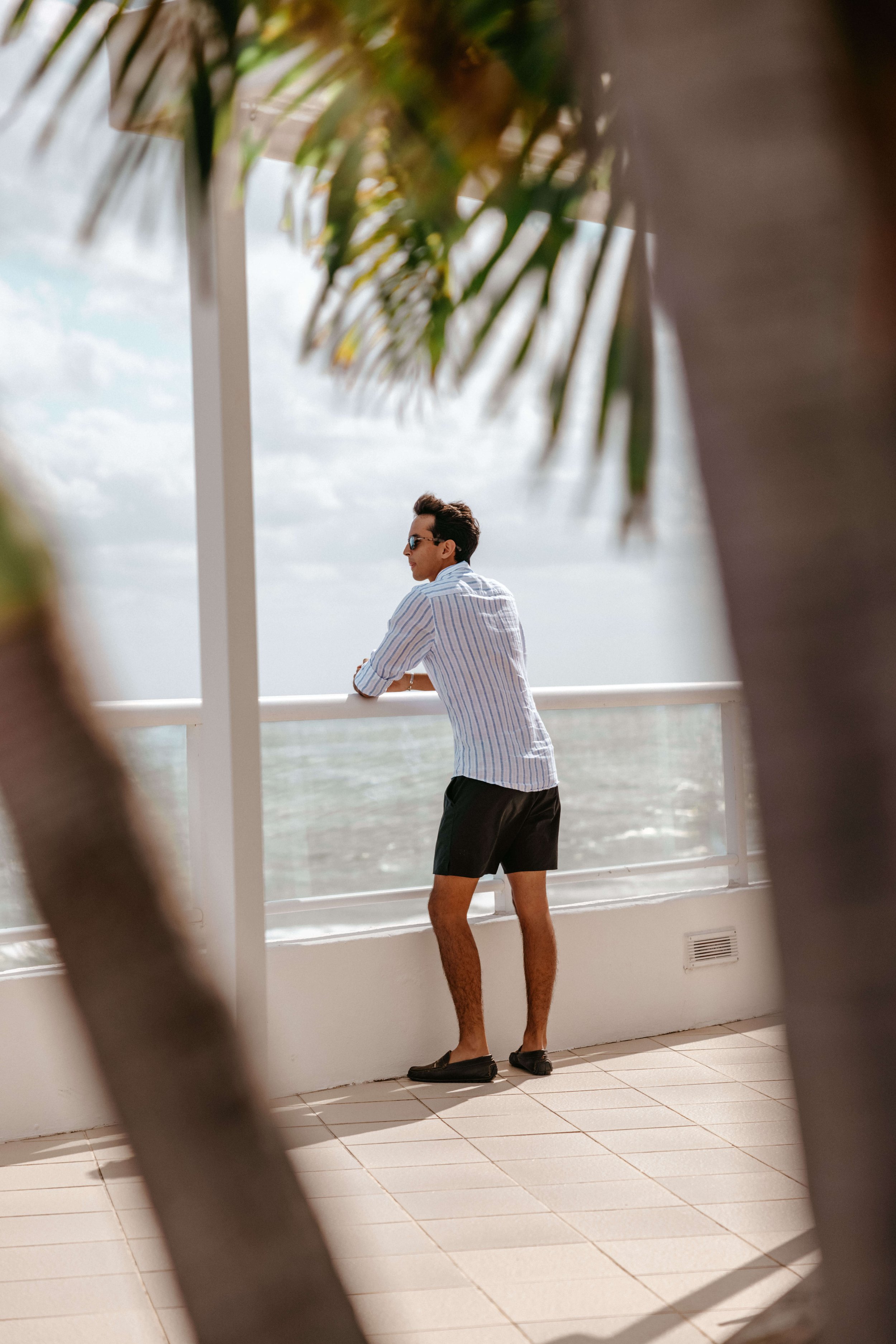 man-looking-out-at-ocean-ritz-carlton-fort-lauderdale-rooftop.jpg