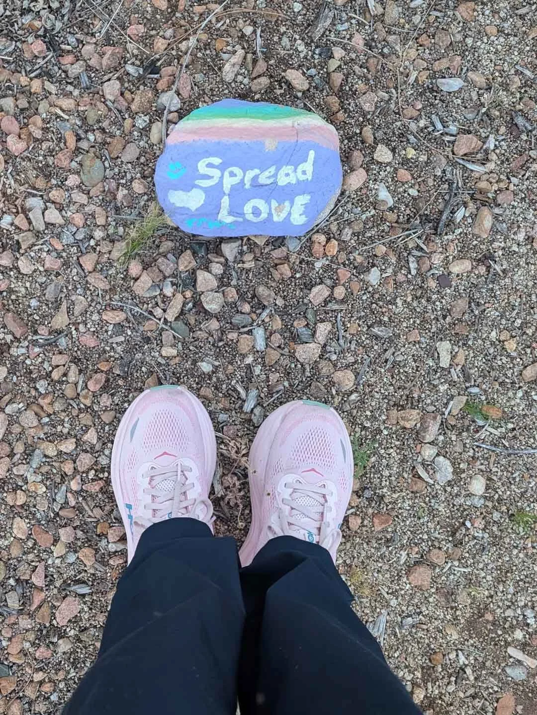 Janet Newbold paused during an Albuquerque walk to take a picture of this painted rock with a heart and loving message.