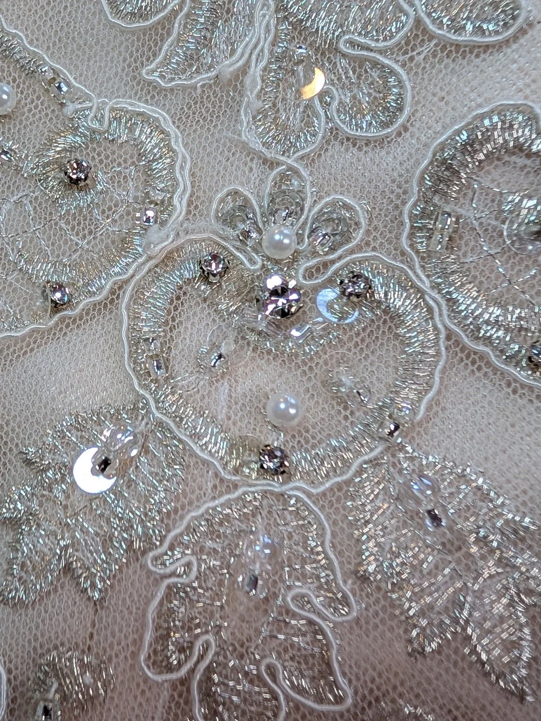 Beautiful lace heart! Chenelle Houston of Utah captured this photo of a wedding dress she did alterations on.