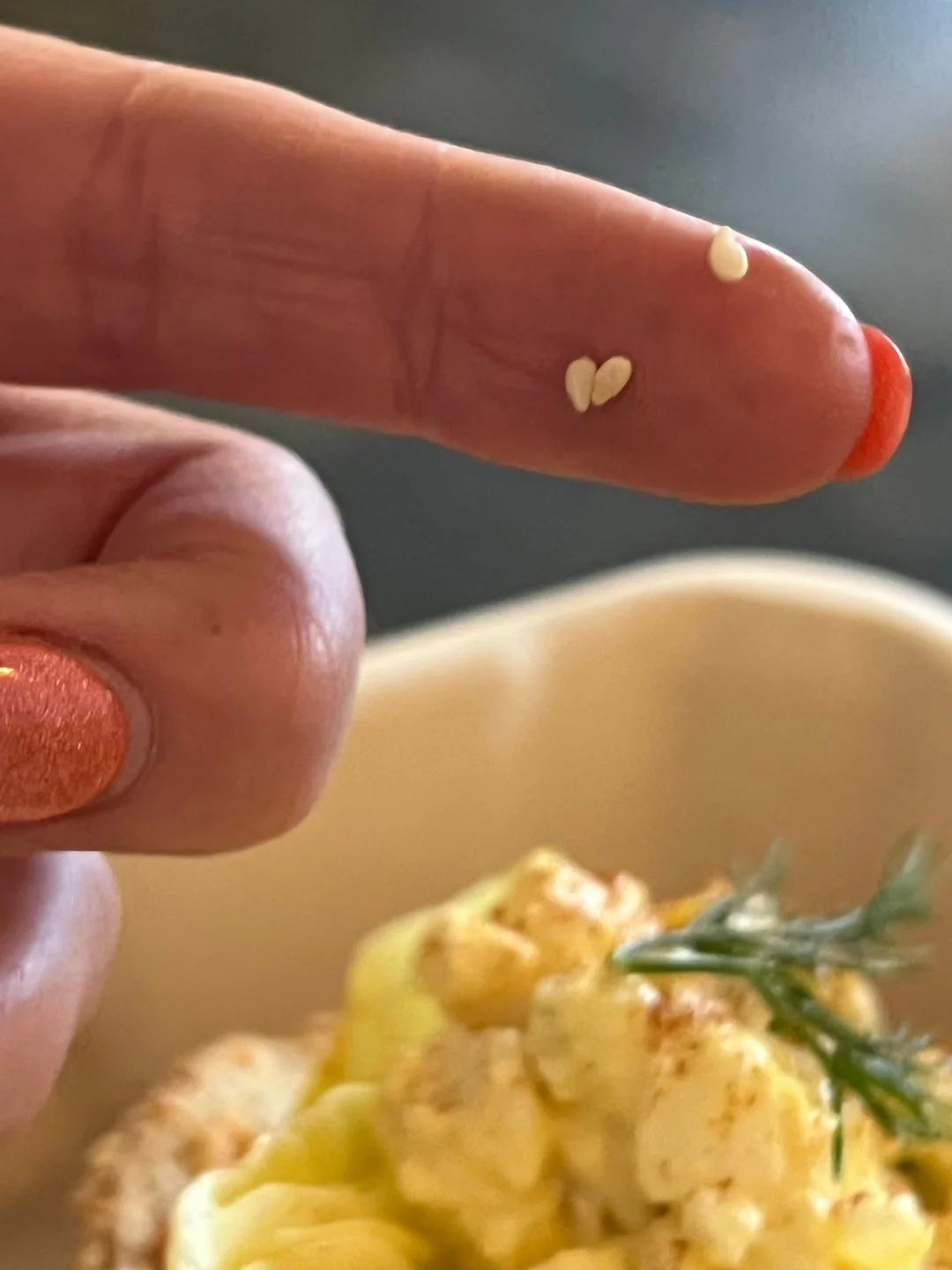 Friends Brittny Goodsell and Devin Felix of Washington noticed this sesame heart on Brittny's finger while she ate a sesame bagel sandwich.