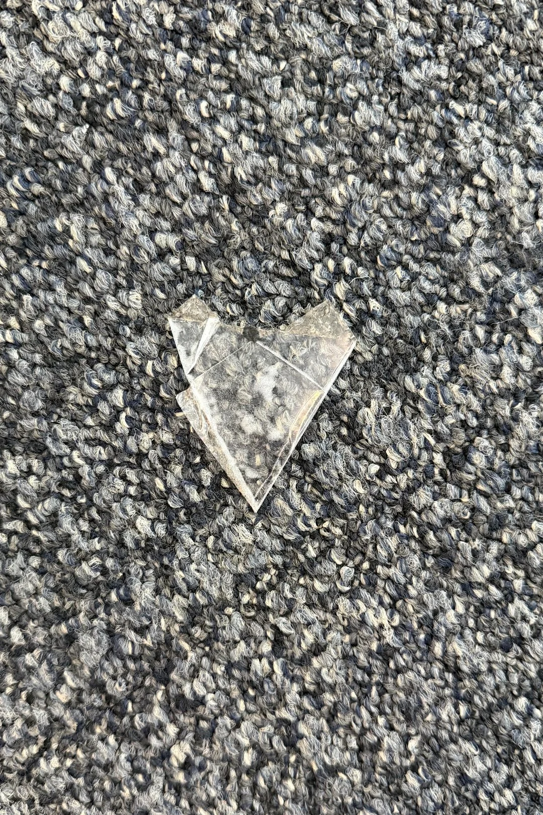 A folded up tape heart on the floor of the San Francisco Airport. I spotted this heart as Travis and I meandered between food courts and gates during a very long layover.