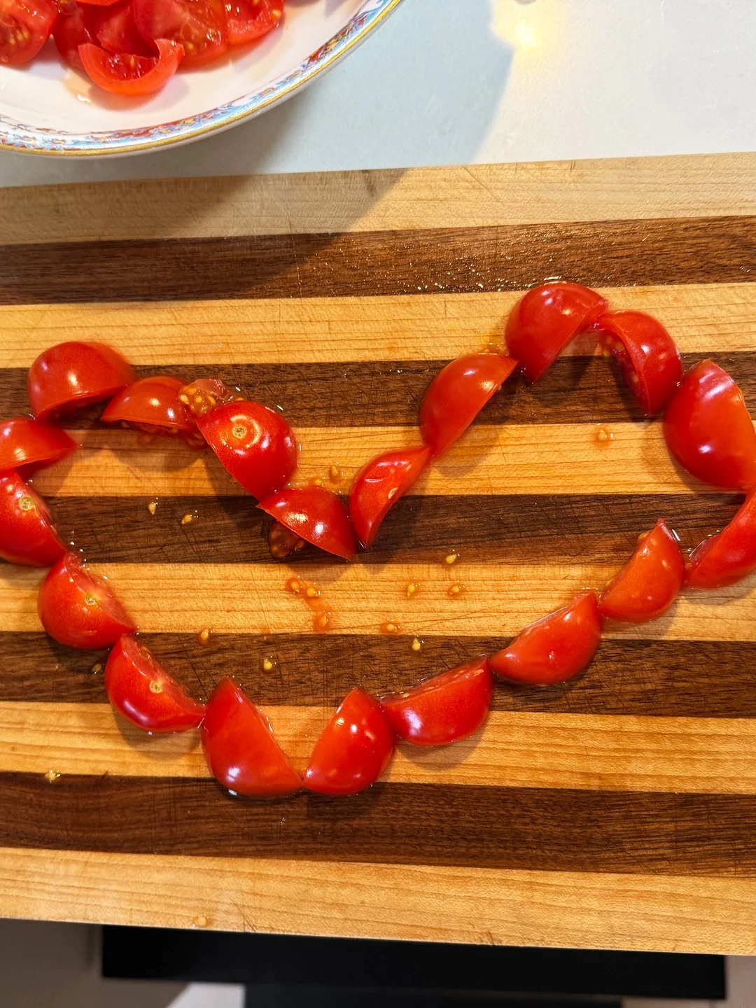 Cute tomato heart created by Donna McMullen's daughter of New Mexico. "Emma left her culinary design amidst creating a Caprese salad."