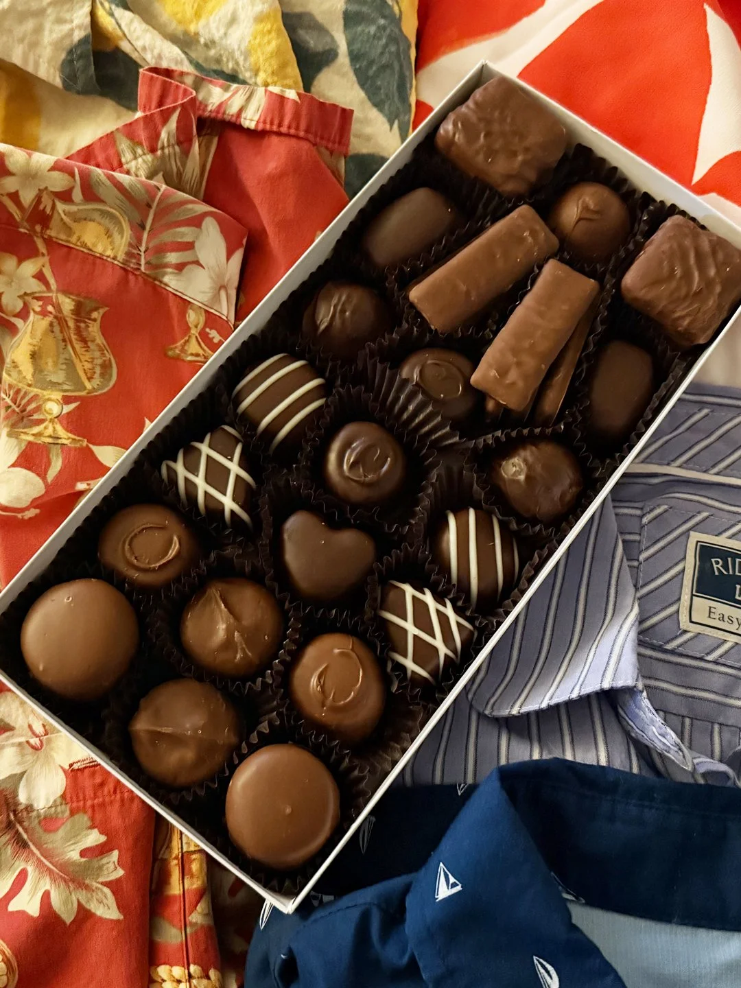 Heart chocolate among other truffles and thrifted shirts. I used Aquaphor on my skin during radiation treatment, so I thrifted bright, button-down shirts that could get ruined.