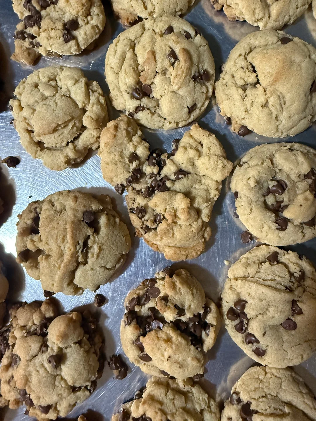 I've been making a lot of cookies this year. Baking helps me concentrate for a while, and I love sharing the goods. In this batch, a somewhat broken cookie made a heart.