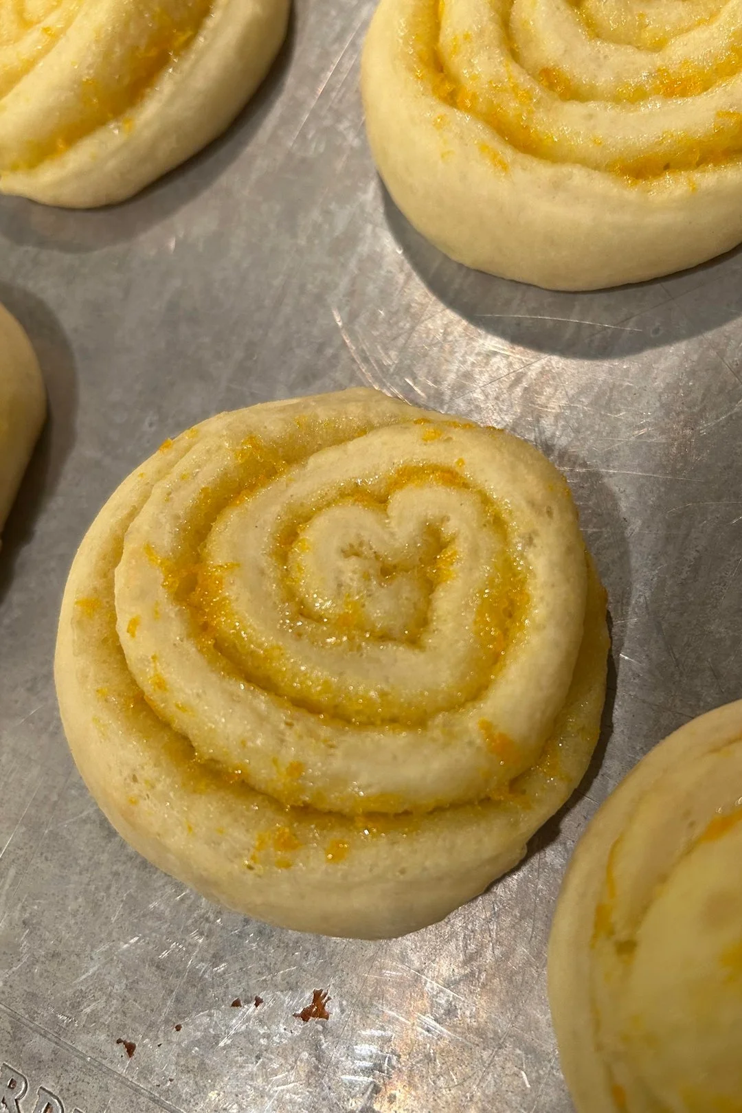 "A tasty heart appears in buttered orange roll dough in preparation for an upcoming Friendsgiving." - Brittny Goodsell of Washington