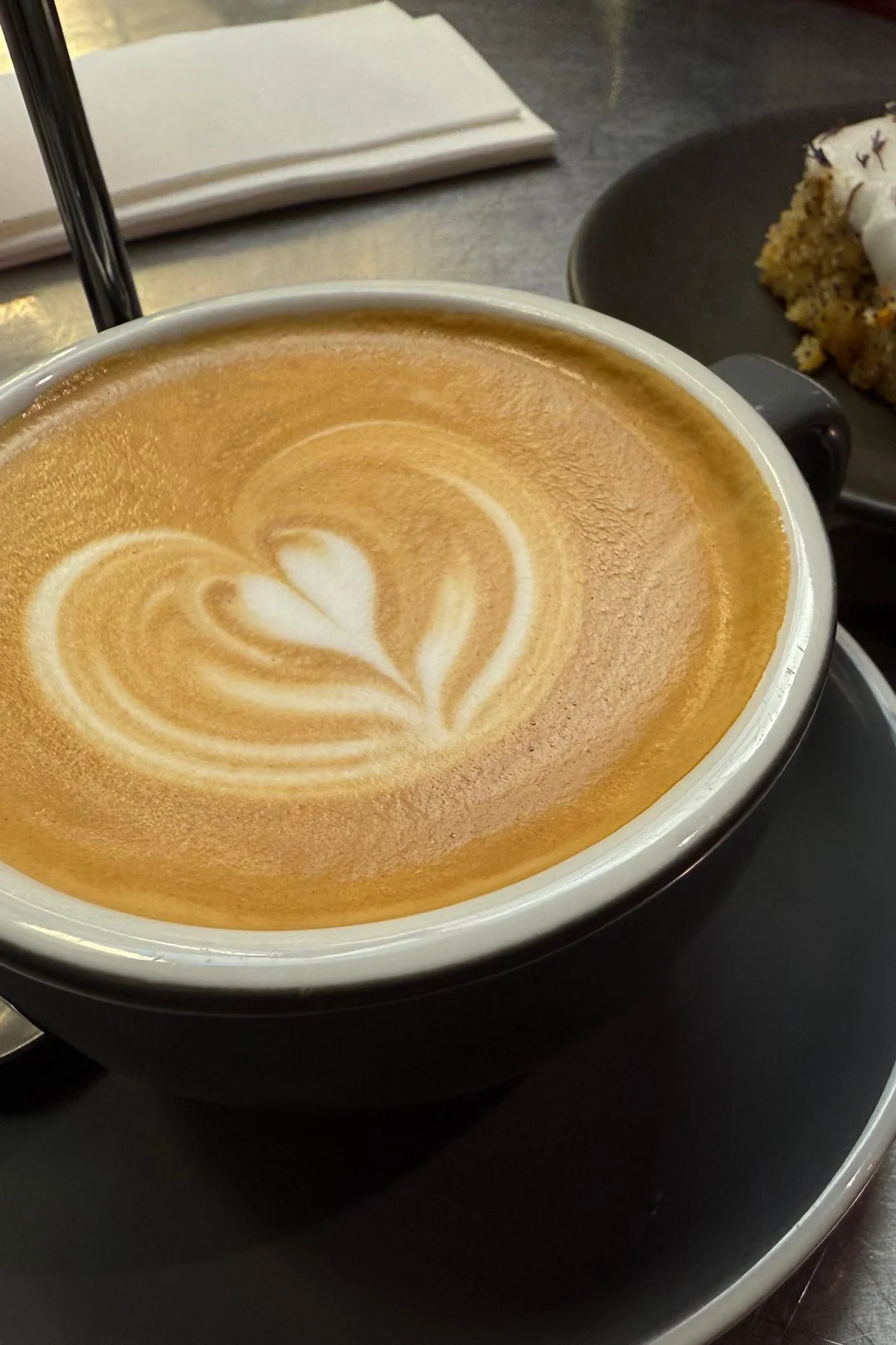 Coffee with a heart and a slice of cake, please! Every morning in Australia, we ventured out to find another coffee shop to try.
