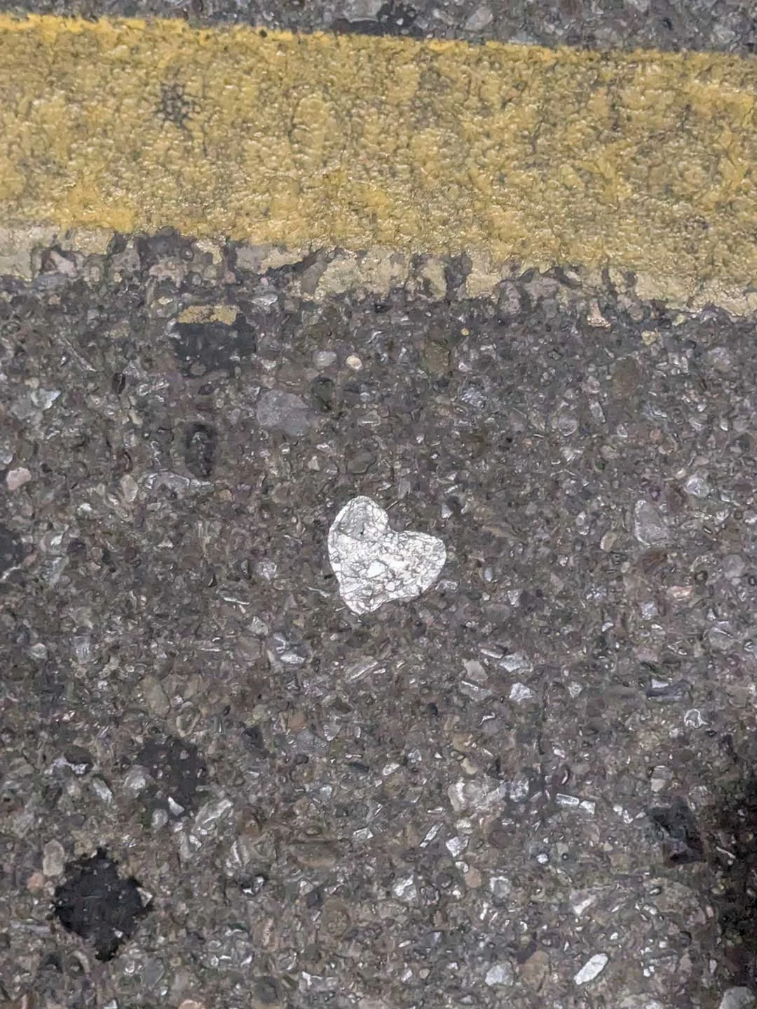 "I was not in a great mood as I had to rush into the store for ingredients. I happened to look down at the right moment to catch this little heart and remind me to take a breath." - Arianna Andreatta of New Mexico