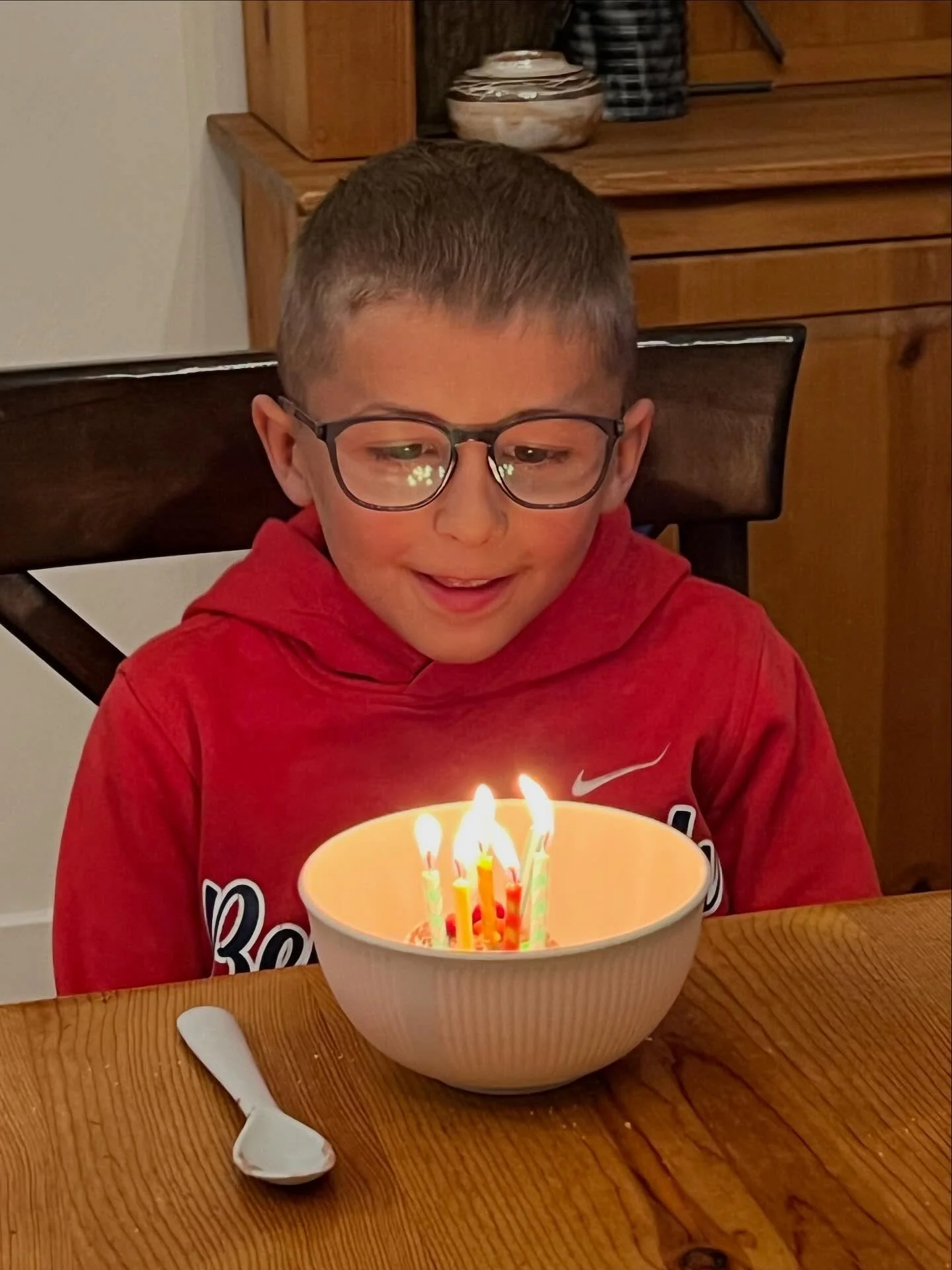 He loves gators, scooters that spark, and somersaulting out of bed in the morning. He knows how to measure and fix things and find out how they work. This weekend after burgers and dogs and chocolate ice cream with candles, I got to do homework with 