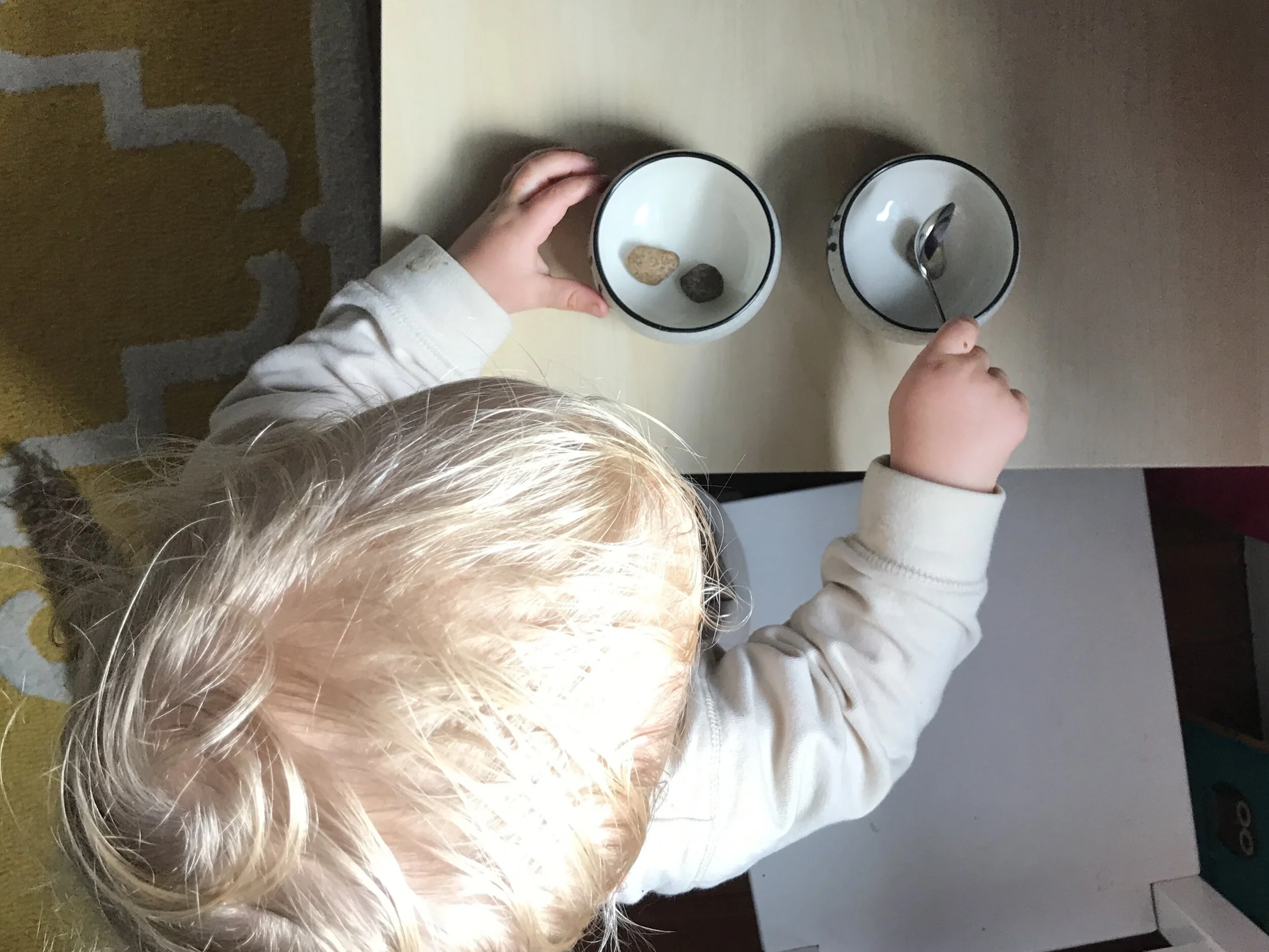 An example of a simple transfer work - one of many Montessori toddler activities that can be prepared with materials you already have at home.