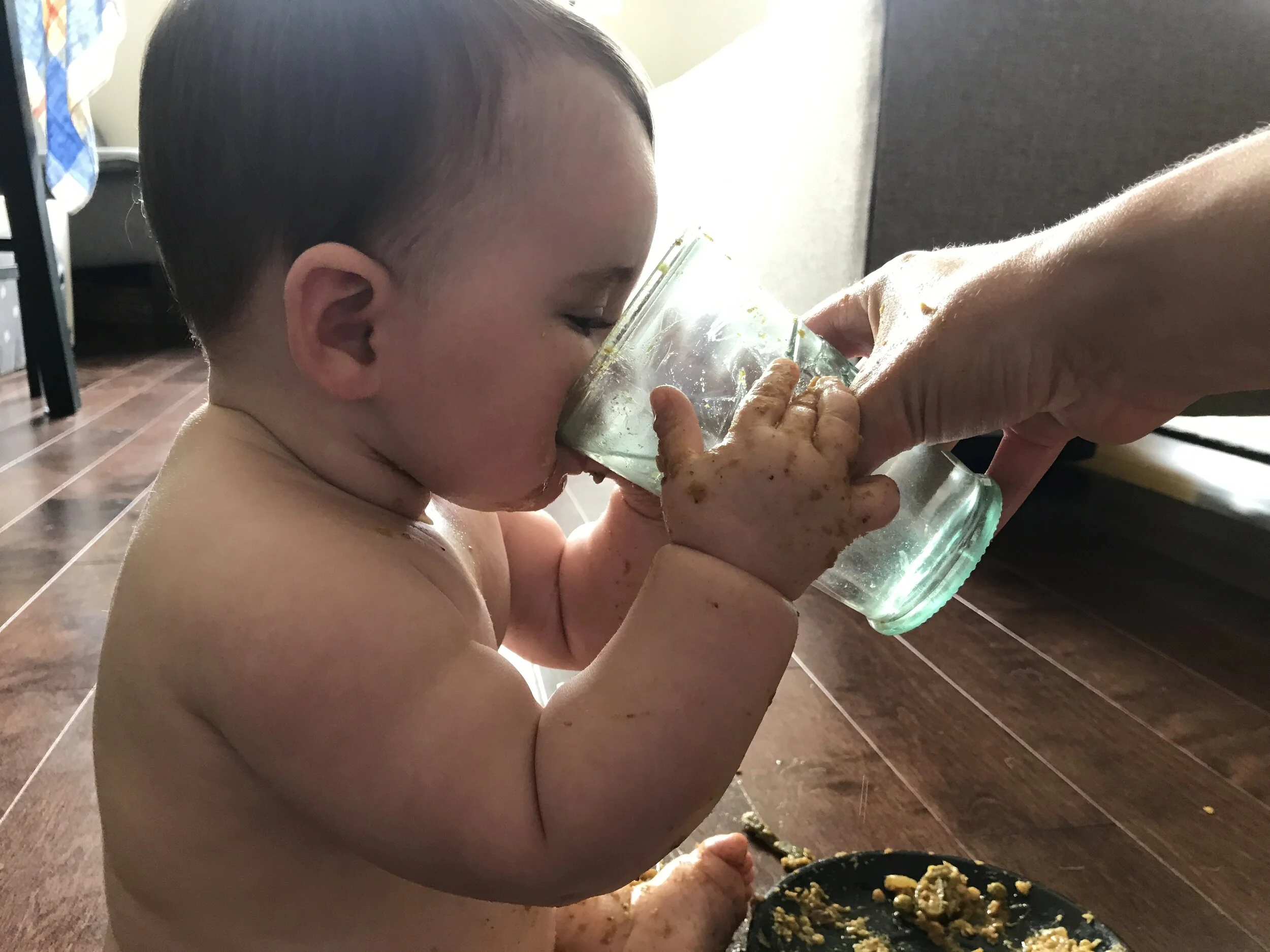 Learning to observe the individual child and their interests helps us determine their readiness for the next step; in this case, drinking from a glass.