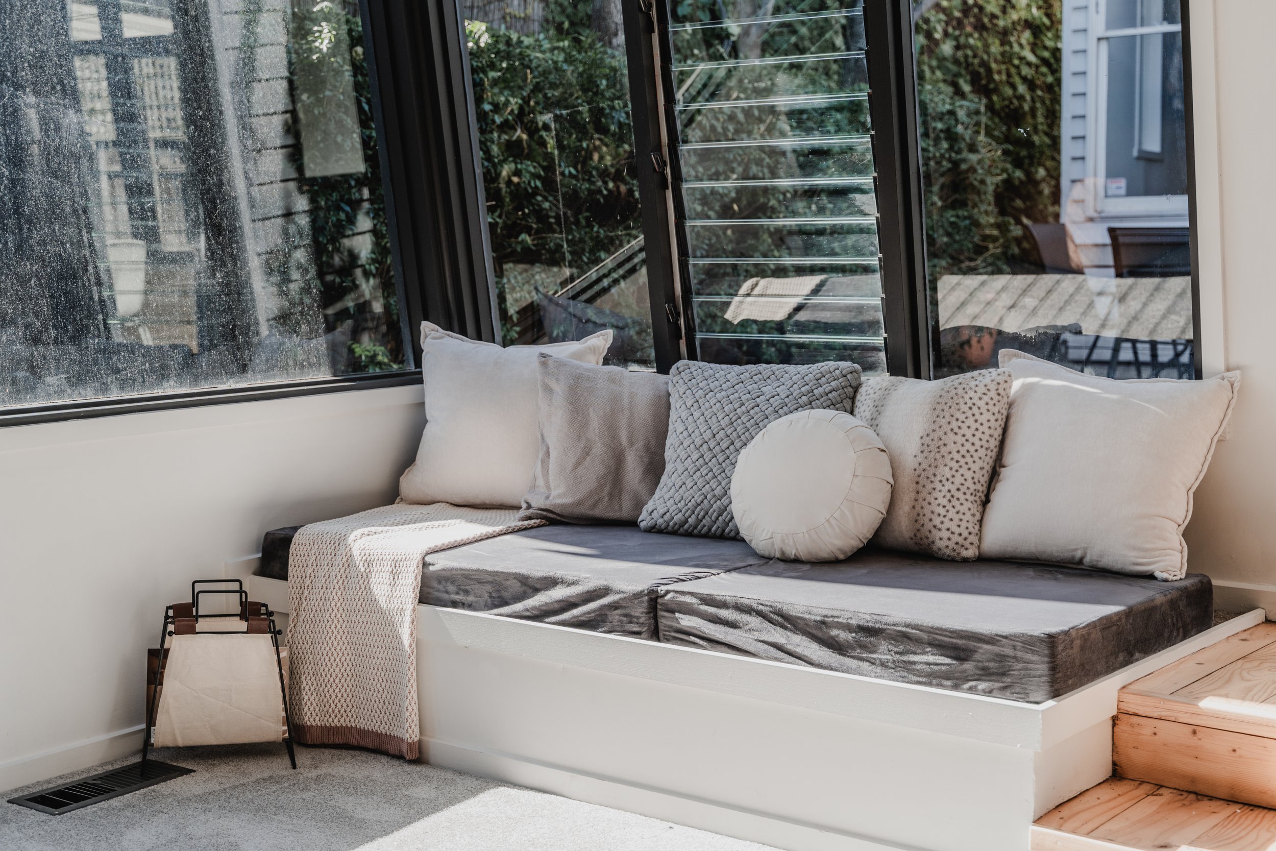 Built-in window seat with cushions in St Kilda Airbnb cottage