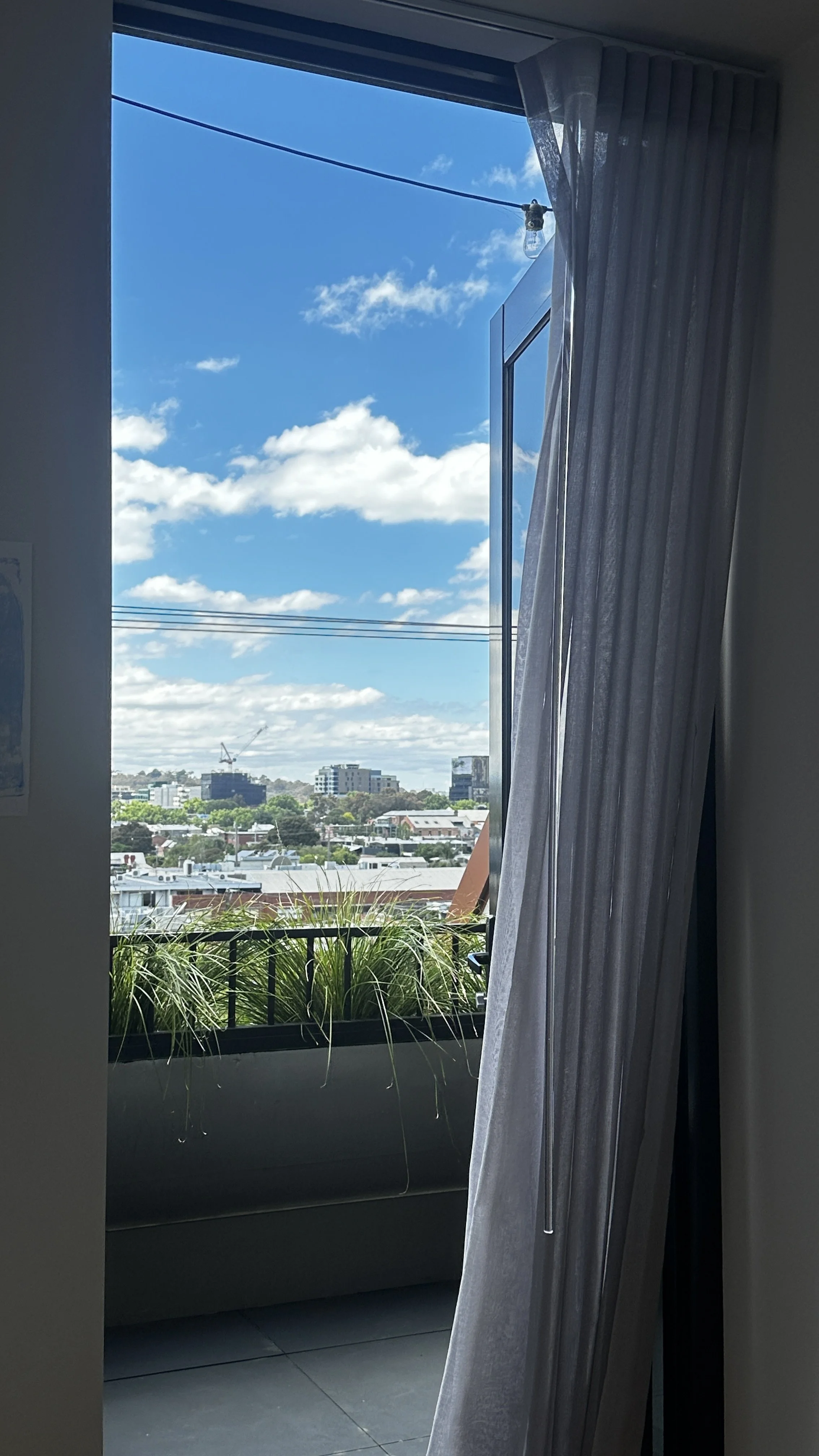 Balcony view over Collingwood from Airbnb apartment near Smith Street