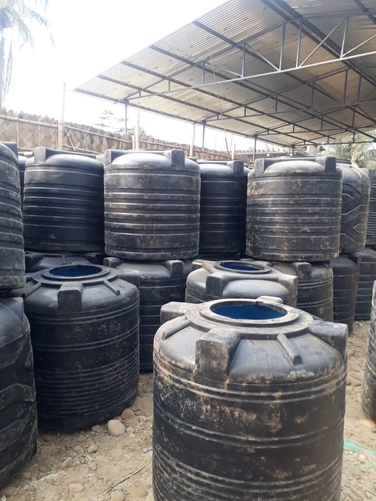 Nzau Village takes Delivery of Water Tanks for Rainwater Harvesting