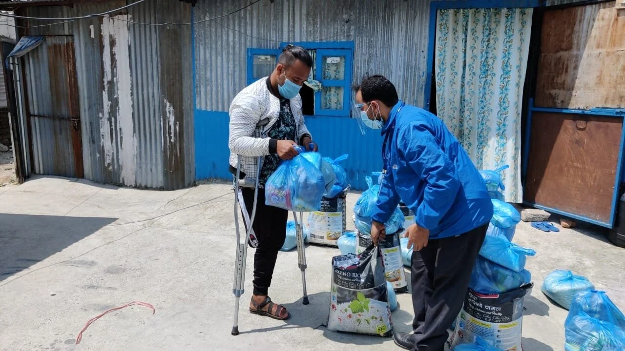People in Nepal that received support pack from our recent appeal. The pack includes the following food: rice, potato, salt, oil, dal, beans, vegetables and meat. The pack also includes a face mask, sanitiser, soaps and gifts for children.