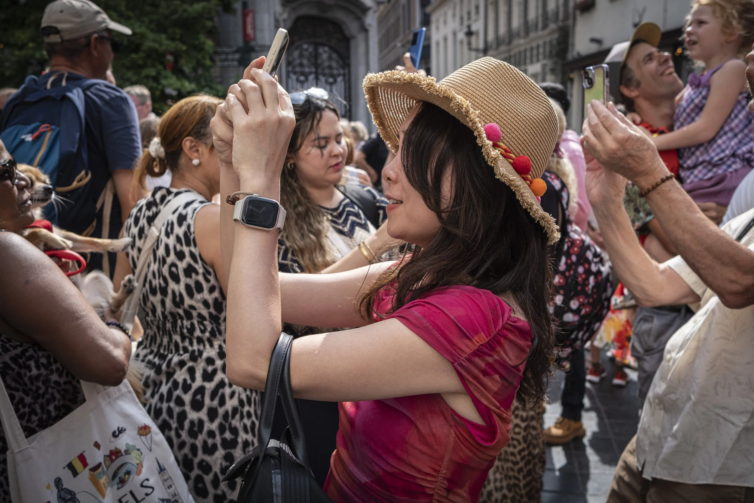 a busy summer in the streets of Brussels.