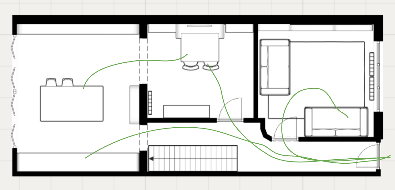 Proposed ground floor plan showing a reinstated wall between the living and dining rooms, with dining bench seating and storage cupboards
