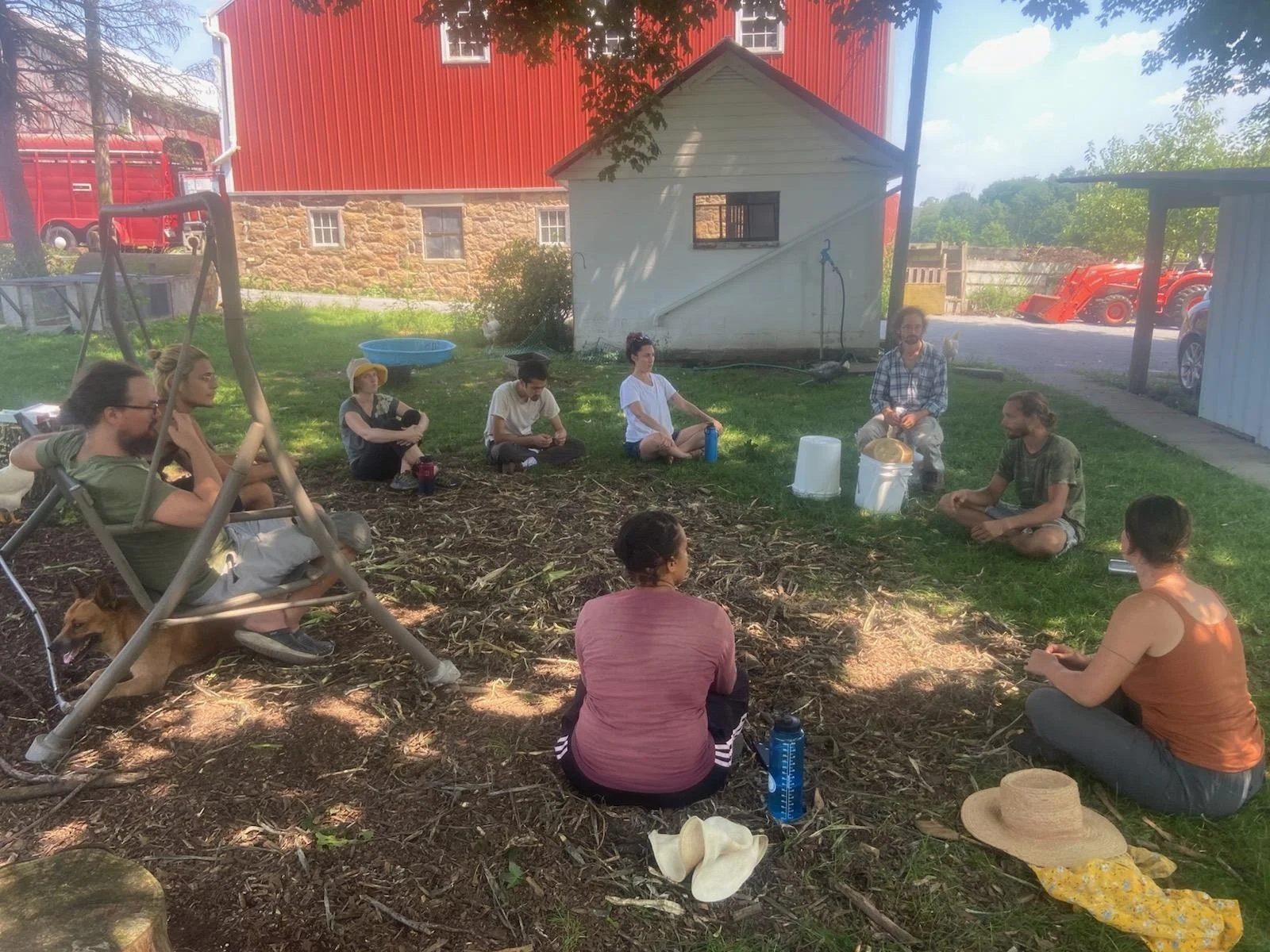 group of people sitting in a circle