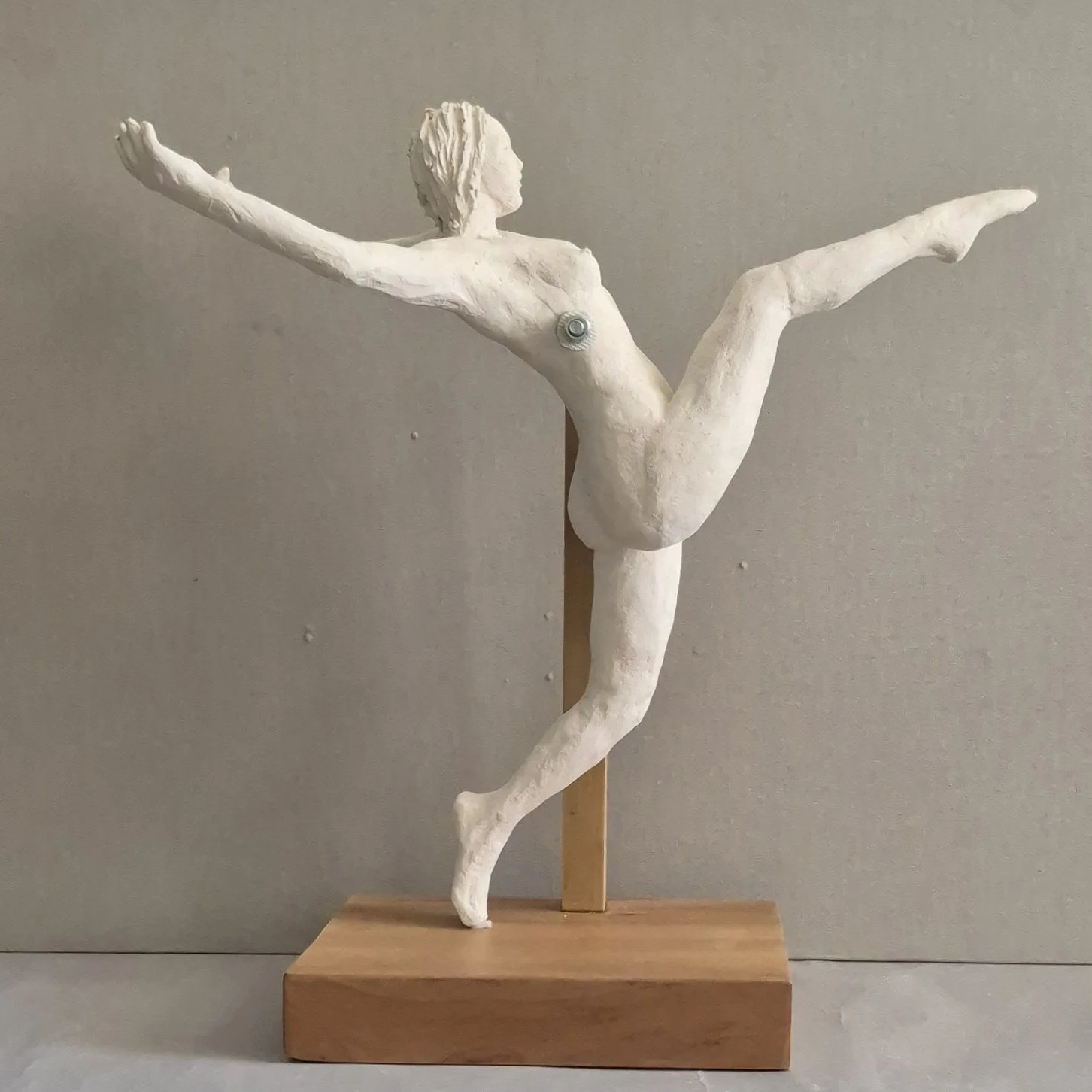 Jack Shapiro, High Kick, 2025, White ceramic on cherry base, 20 inches, $800