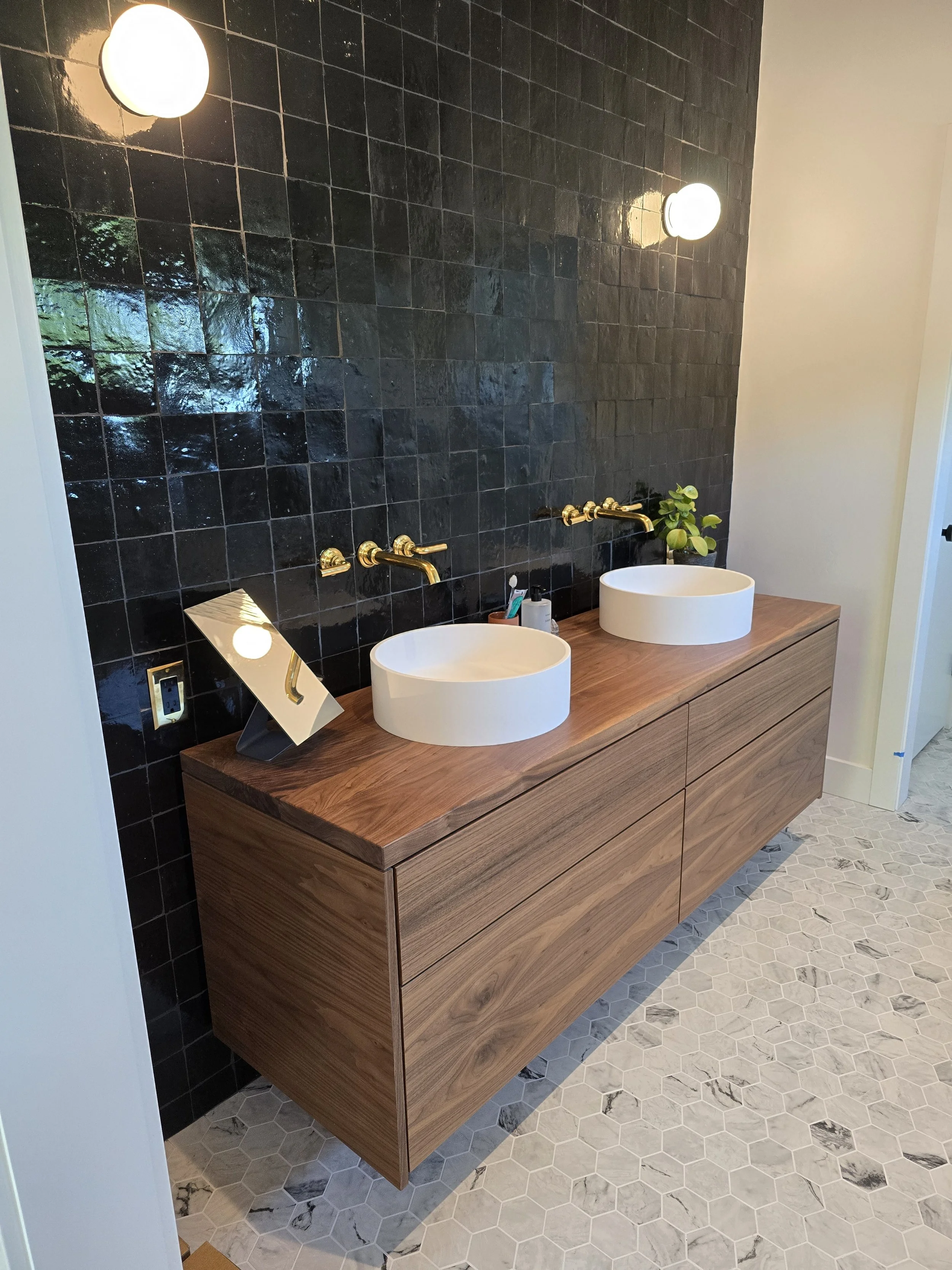 Floating Walnut Vanity with Custom Hardwood Countertop and Push-to-Open Drawers